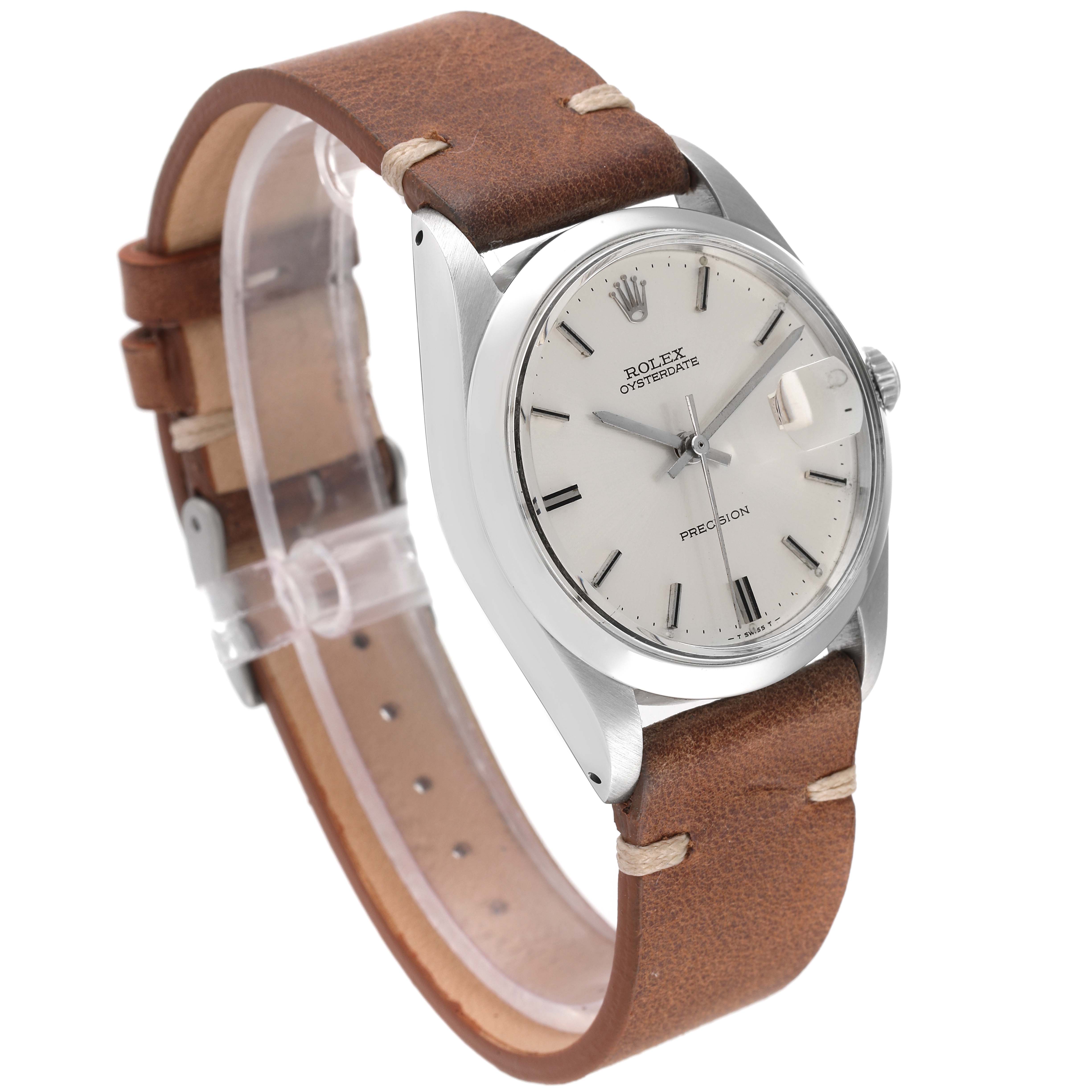 This Rolex Date 6694 Men's Stainless Steel Silver Dial 6694 Men's Stainless Steel Silver Dial model watch is shown at an angle displaying the face, bezel, case, and brown leather strap.