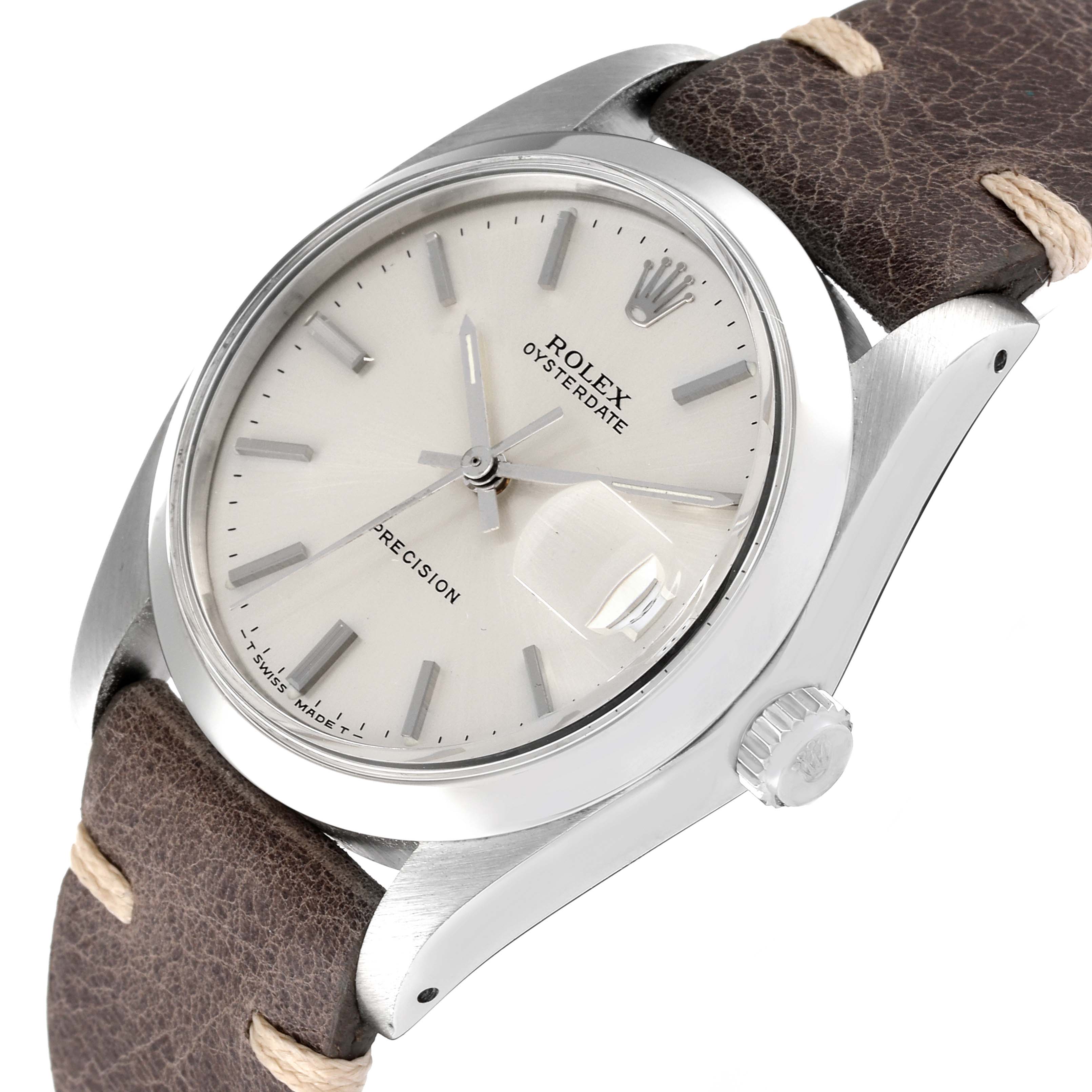 This image shows a Rolex Oysterdate Precision watch at a slight angle, highlighting the face, crown, and leather strap.
