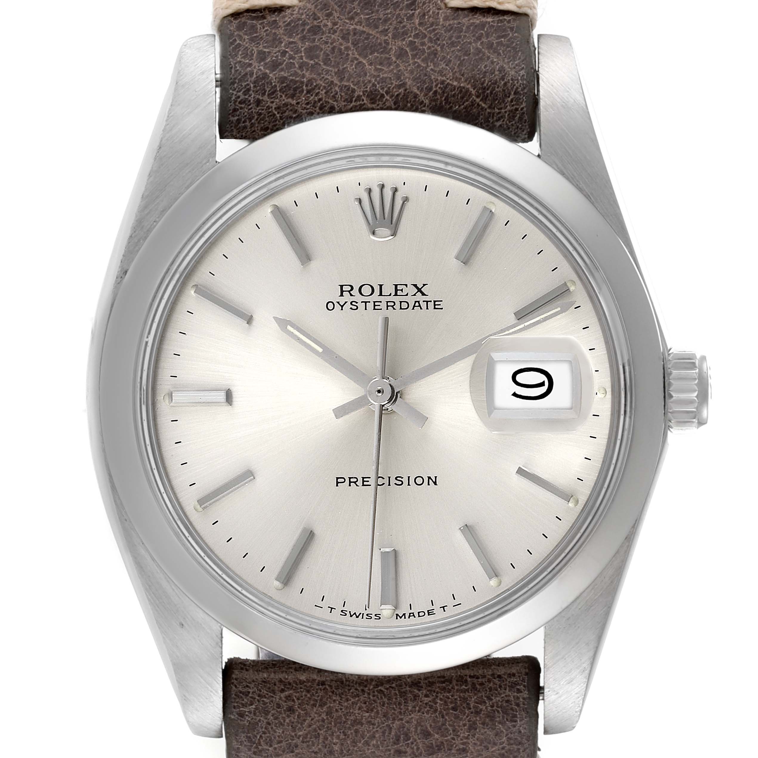 The image shows a front view of a Rolex Oysterdate Precision watch, displaying the dial, hands, date, crown, and a leather strap.