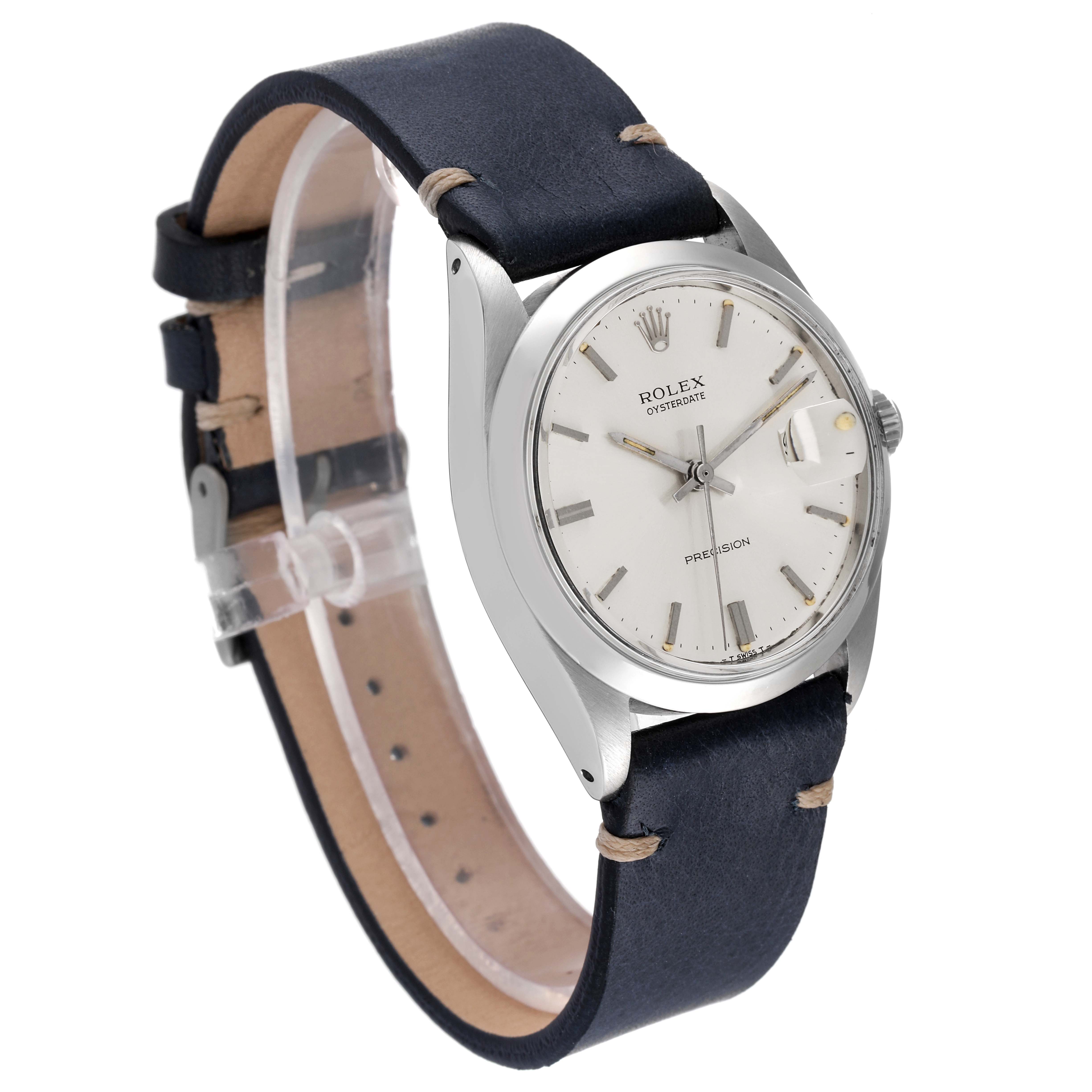 The Rolex Date 6694 Men's Stainless Steel Silver Dial 6694 Men's Stainless Steel Silver Dial watch is shown at an angled side view, displaying the face, bezel, crown, and leather strap.