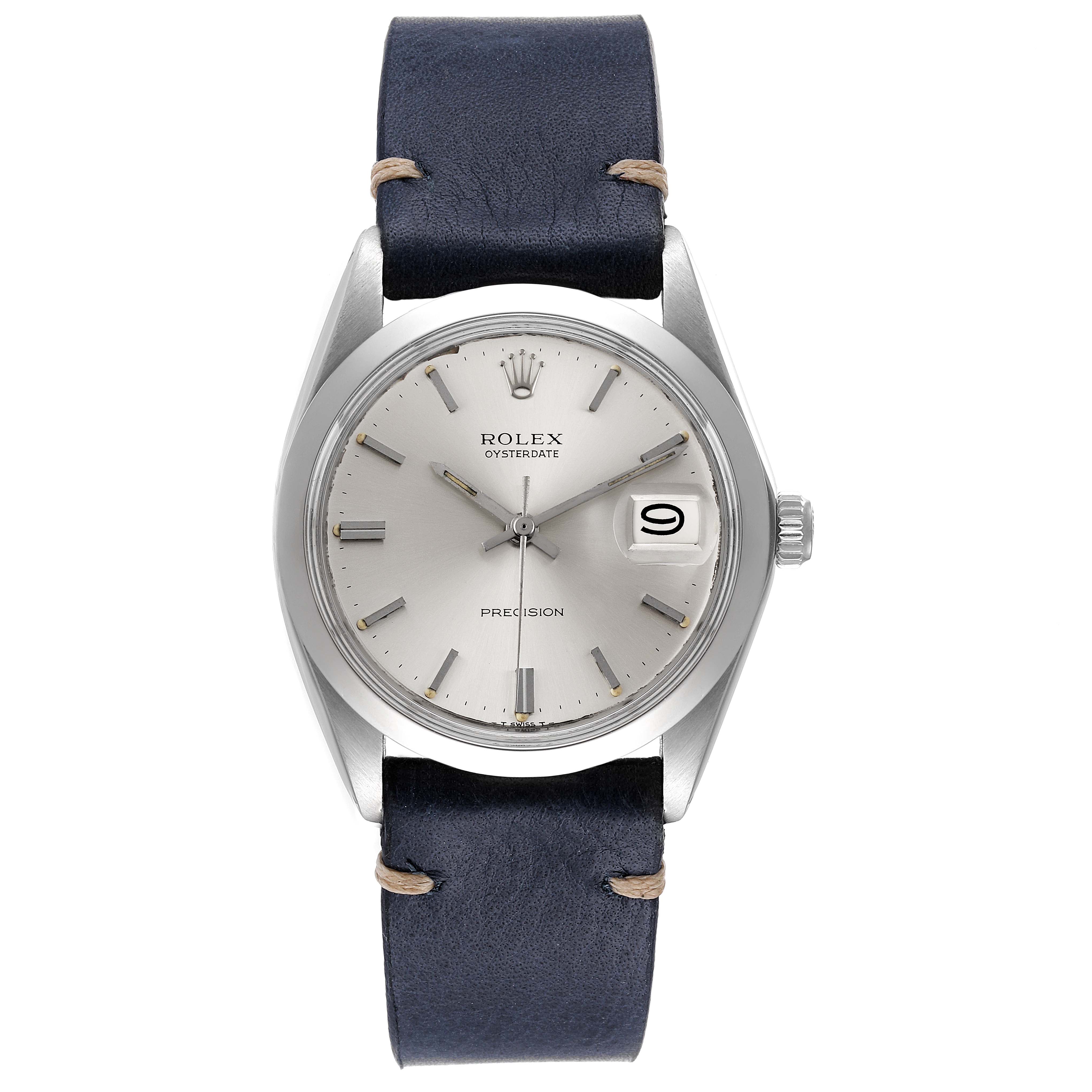 The image shows a front view of a Rolex Oyster Date watch, highlighting its dial, hands, and date window.