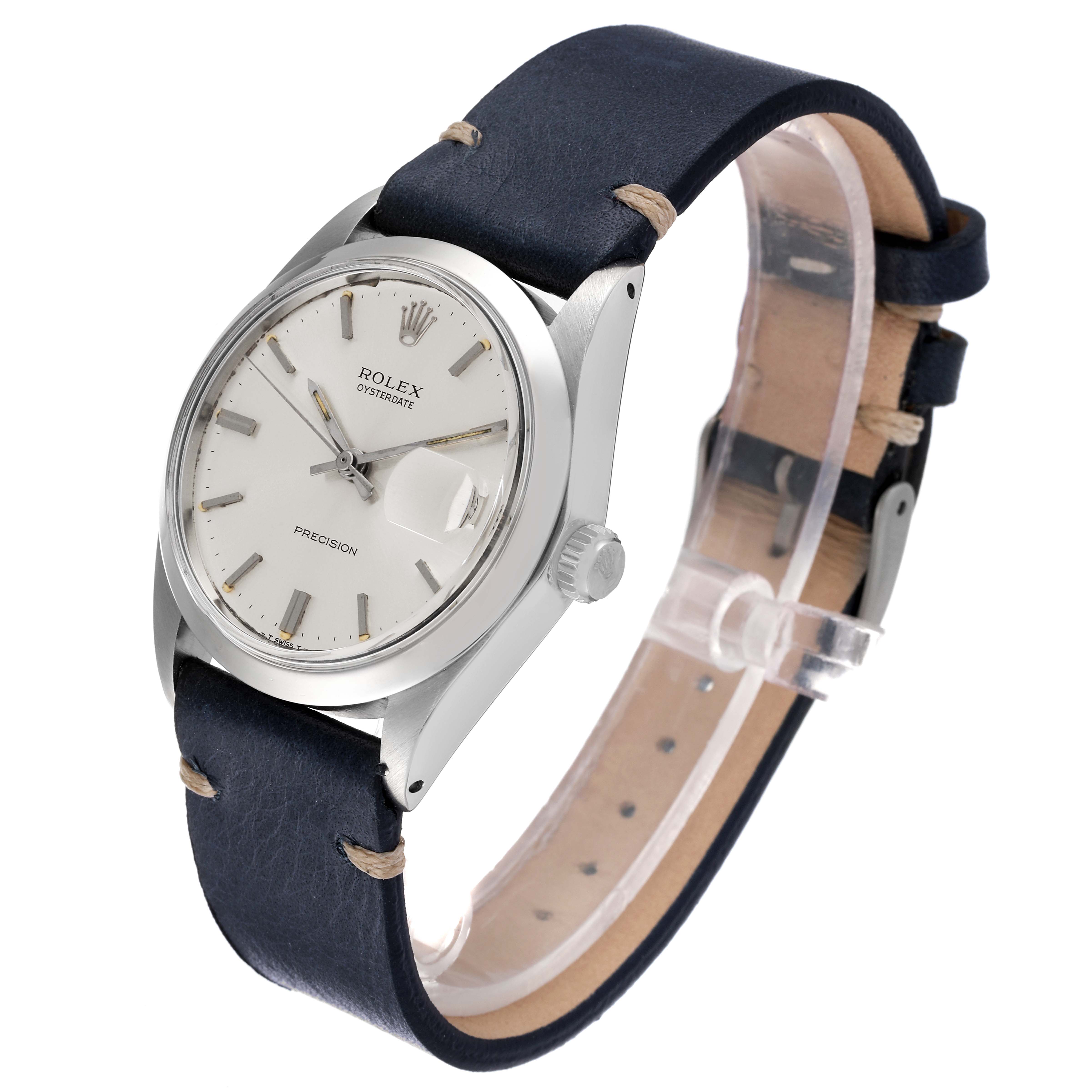 This image shows a side-front angle of the Rolex Oysterdate Precision watch with a black leather strap.