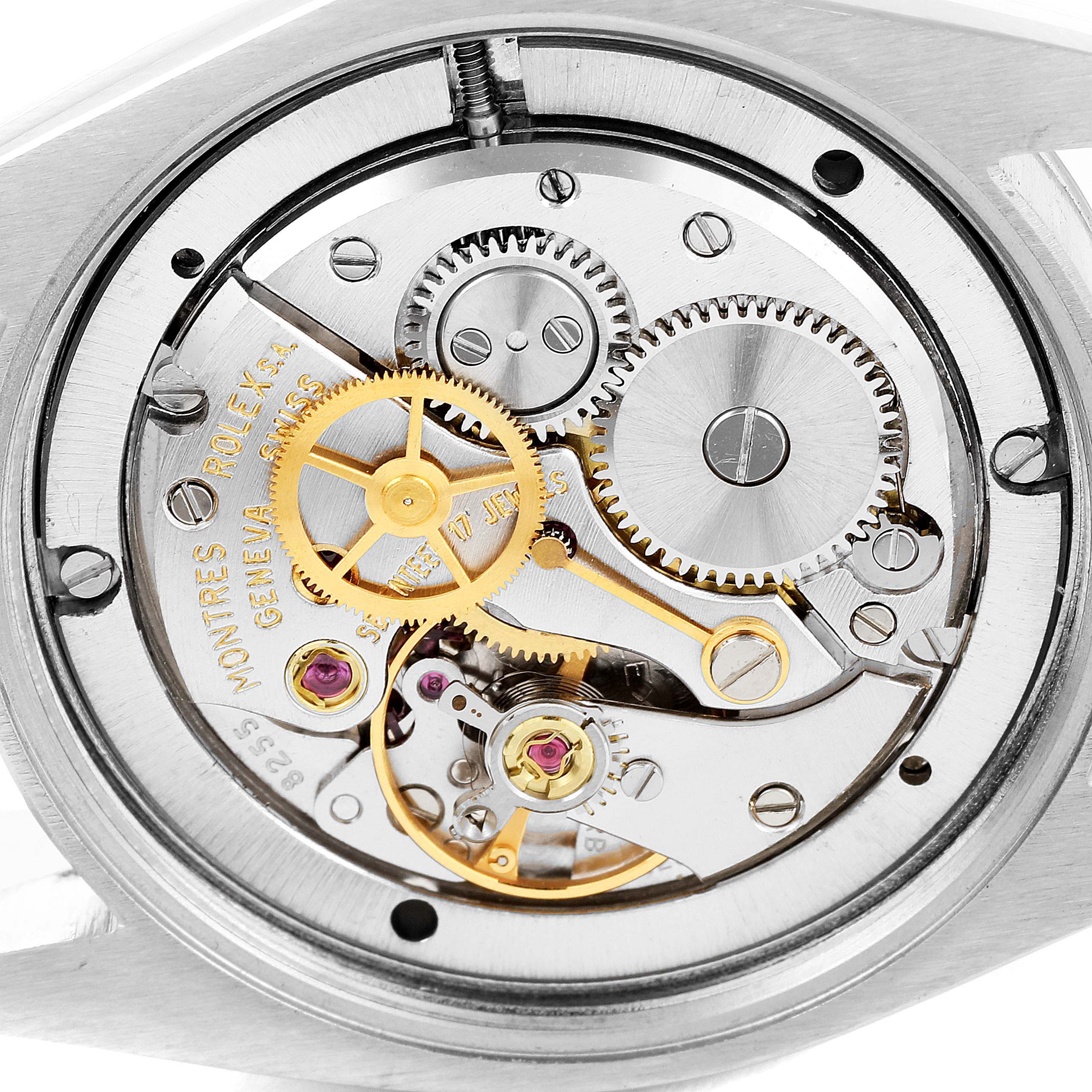 This image shows the movement mechanism of a Rolex Date 6694 Men's Stainless Steel Silver Dial 6694 Men's Stainless Steel Silver Dial model watch, highlighting the gears and internal components.