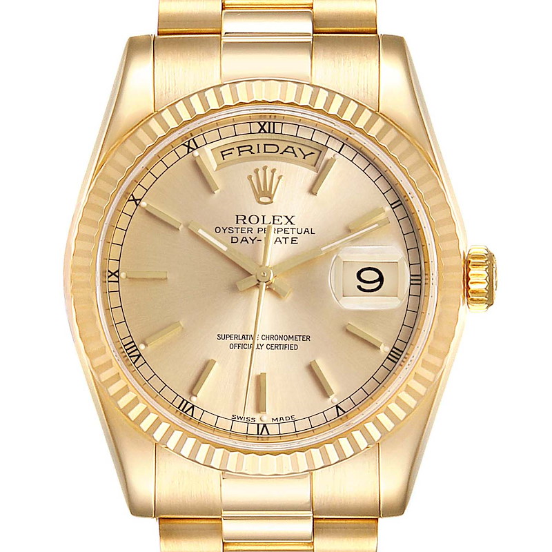 This image shows a front view of a Rolex President model watch, showcasing its gold case, dial, bracelet, and day-date features.