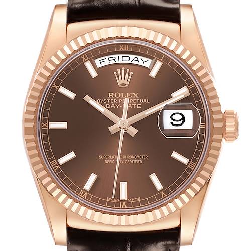 The Rolex President 118135 Men's Rose Gold Brown Dial watch is shown from a front angle, highlighting the brown dial, day and date windows, bezel, and crown.