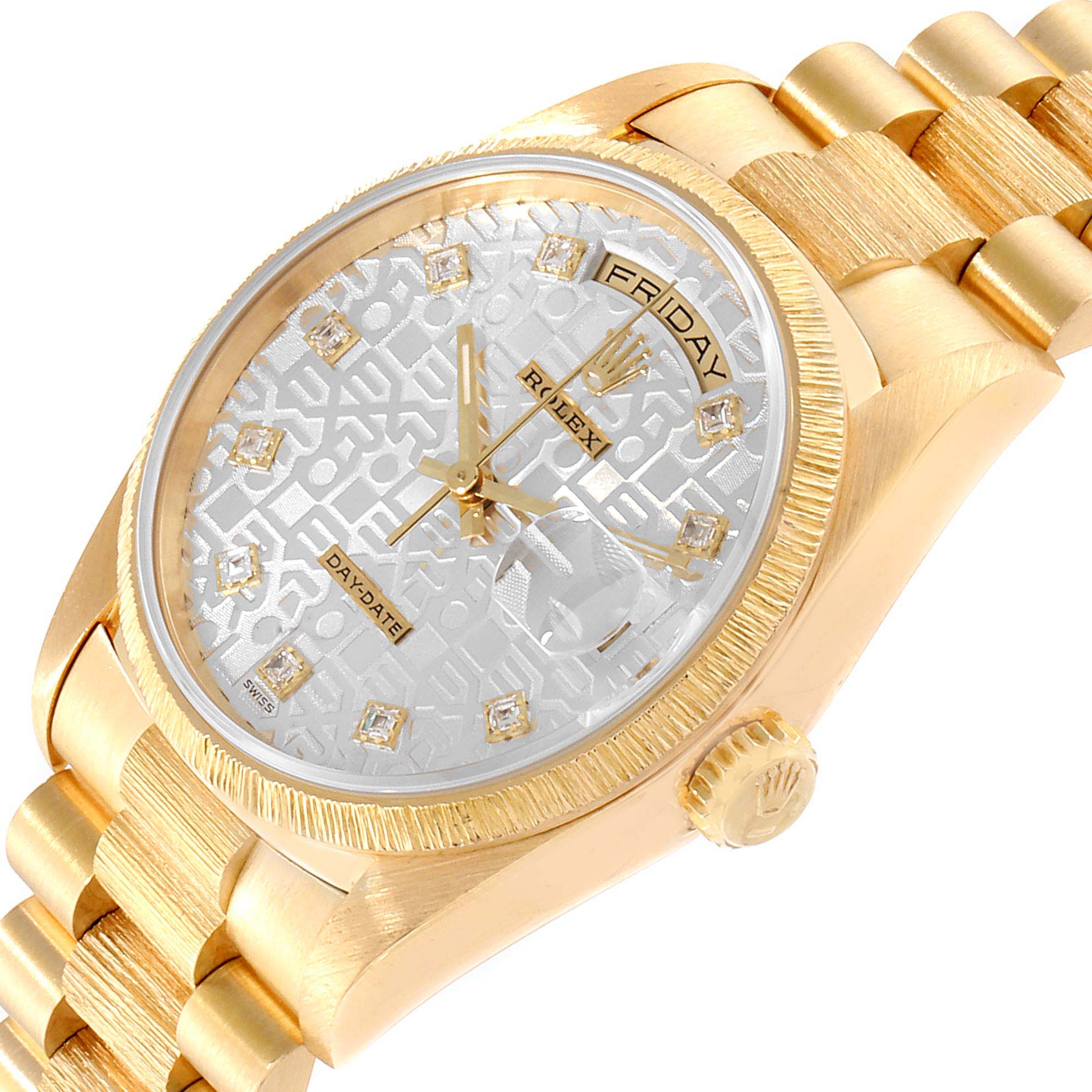This image shows a close-up, angled view of a gold Rolex President 18248 Men
s Yellow Gold Silver Dial 18248 Men
s Yellow Gold Silver Dial model watch featuring its face, bezel, and part of the bracelet.
