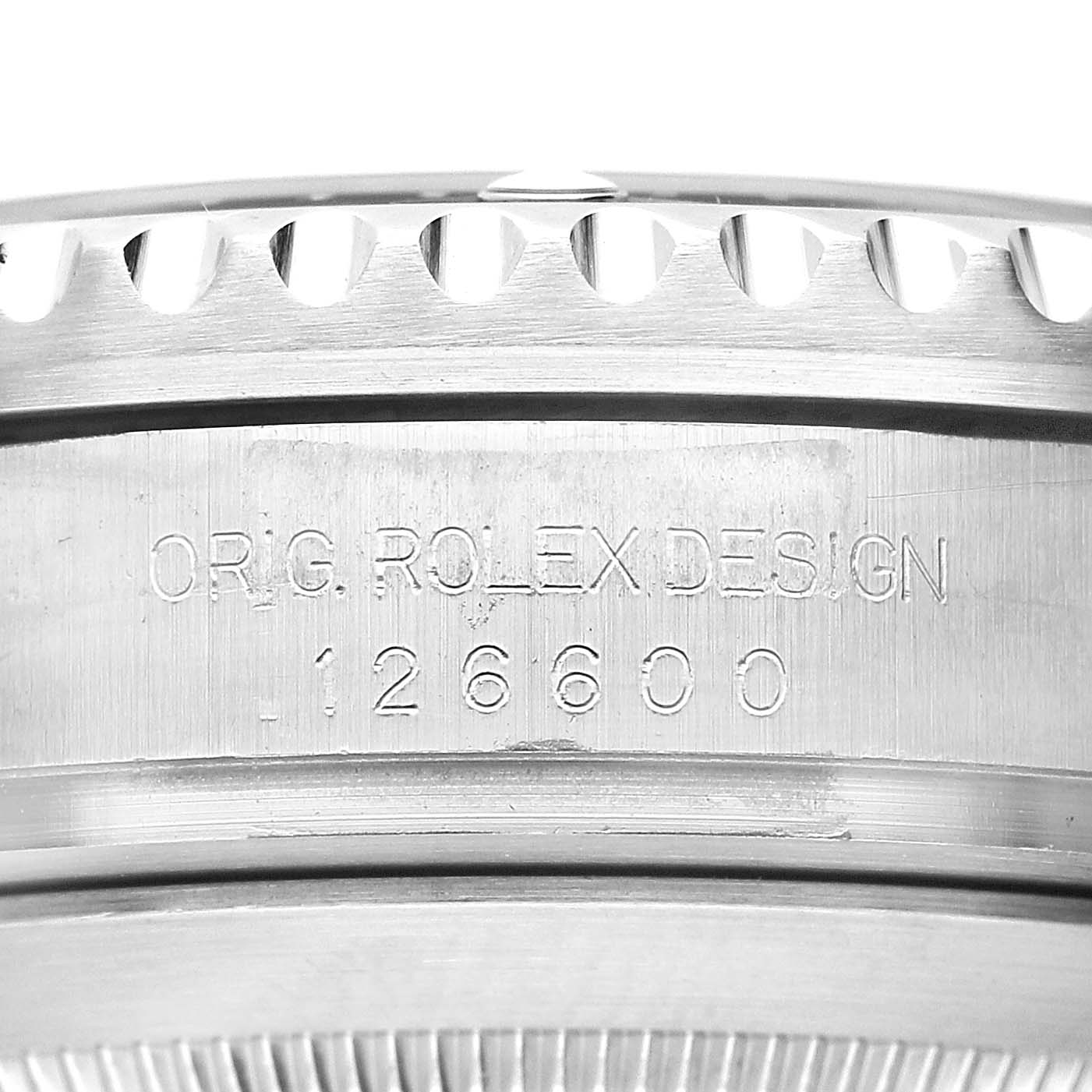 The image shows the side of a Rolex Sea-Dweller 126600 Men's Stainless Steel Black Dial watch, highlighting the model number and design engraving.