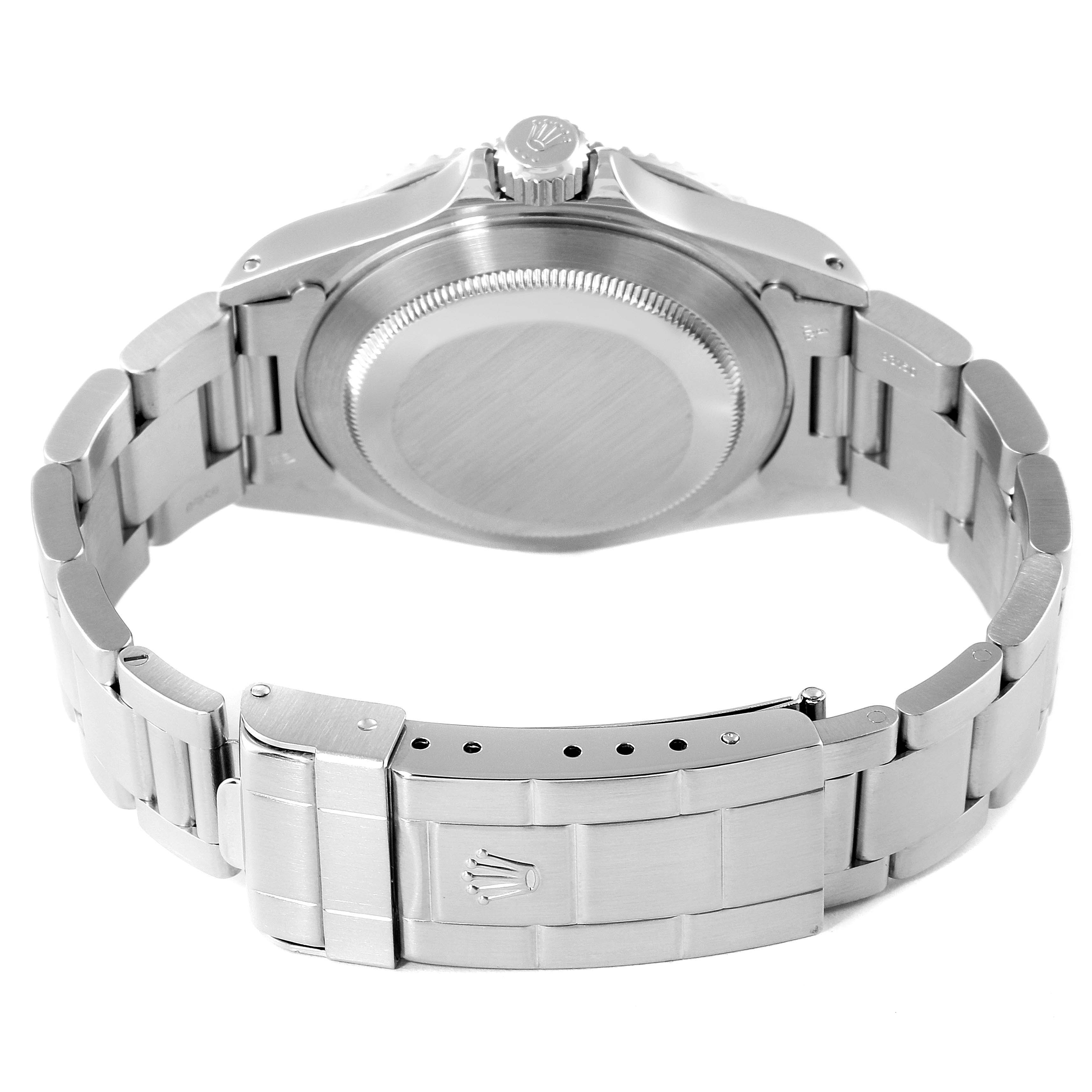 This image shows the back view of the case and the bracelet clasp of a Rolex Submariner 14060M Men
s Stainless Steel Black Dial 14060M Men
s Stainless Steel Black Dial watch.