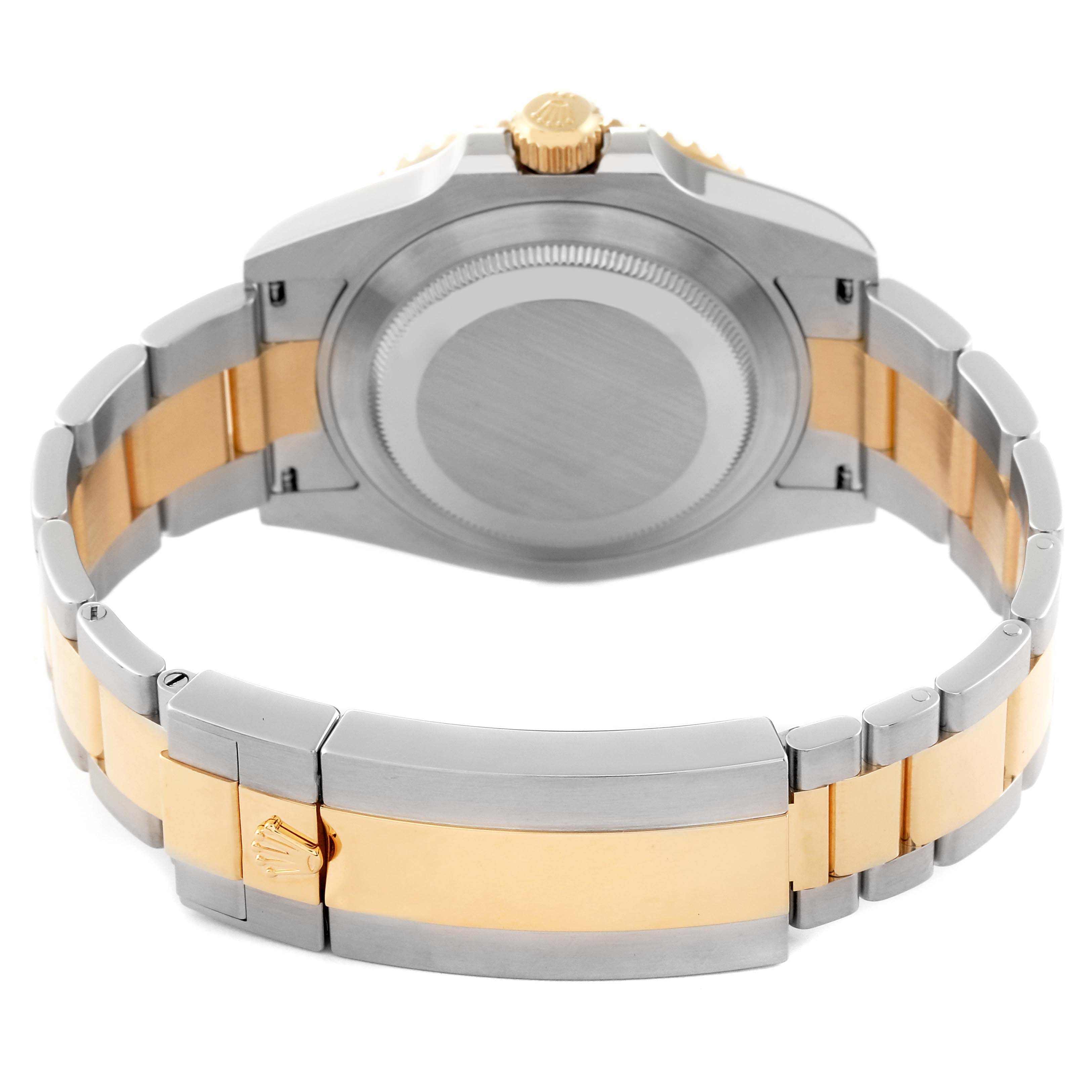 This image shows the case back and bracelet of the Rolex Submariner 126613 Men's Steel and Gold (two tone) Blue Dial 126613 Men's Steel and Gold (two tone) Blue Dial from a rear angle.