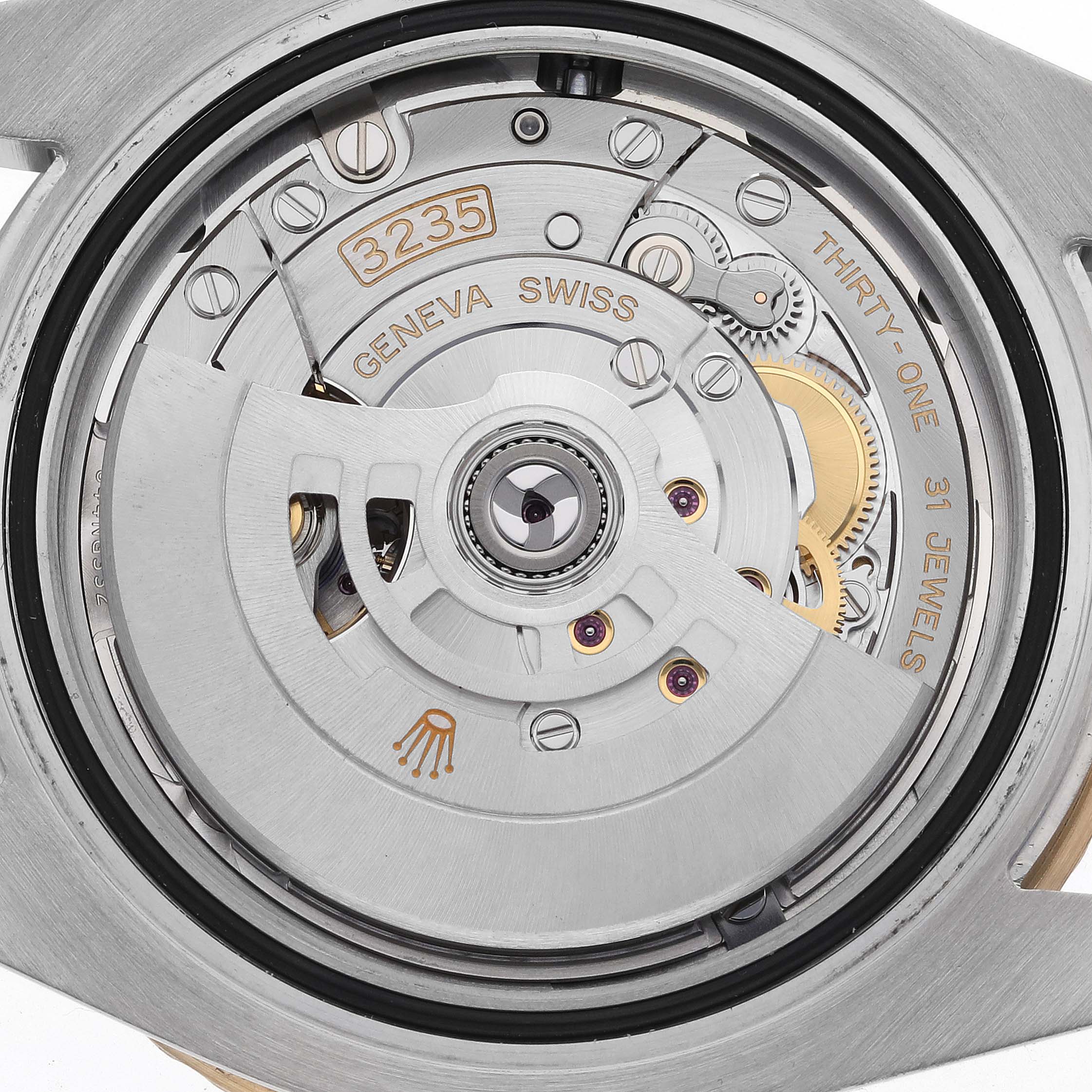 The image shows a close-up of the movement of a Rolex Submariner 126613 Men's Steel and Gold (two tone) Blue Dial 126613 Men's Steel and Gold (two tone) Blue Dial, specifically the caliber 3235.