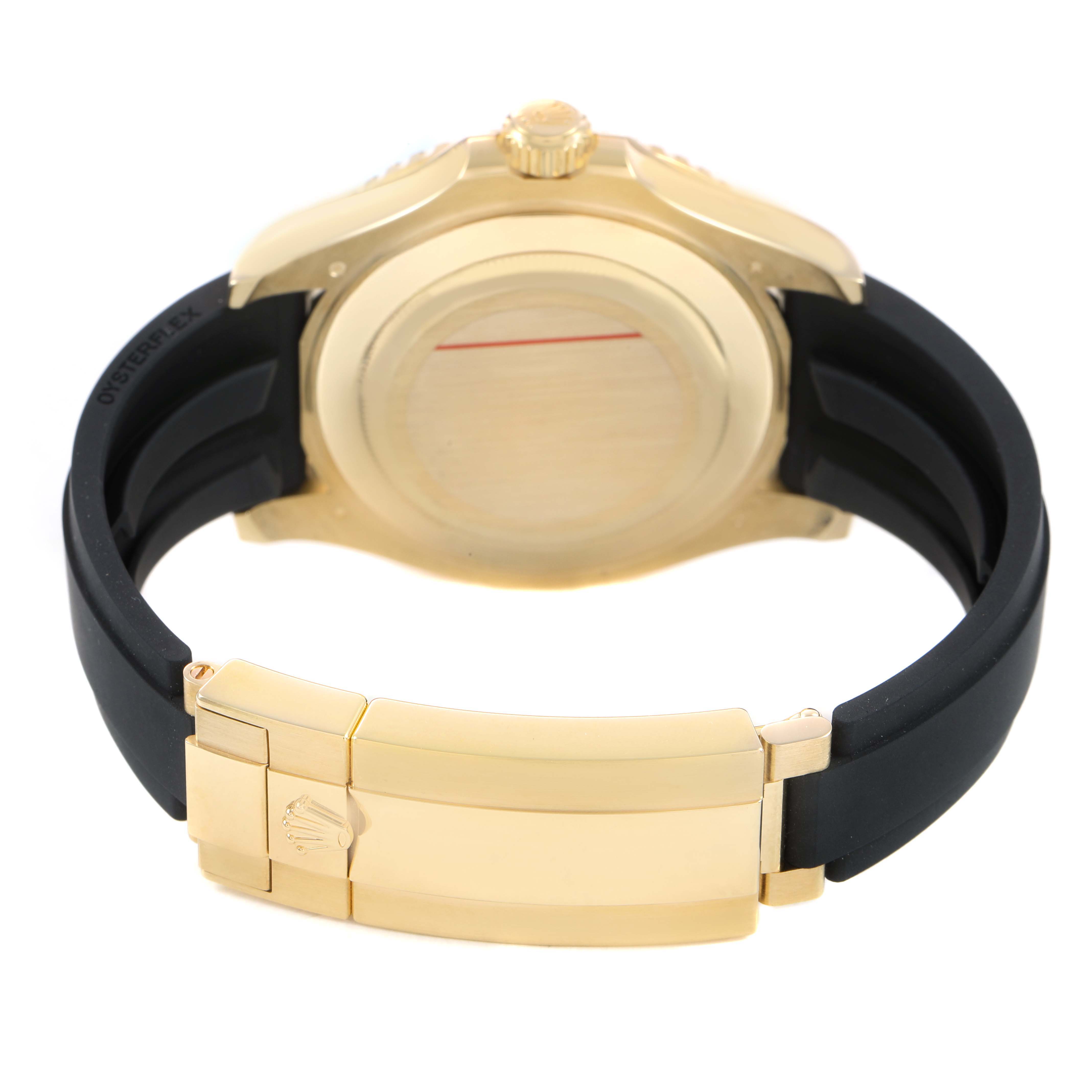 The image shows the back of the Rolex Yacht-Master 226658 Men's Yellow Gold Black Dial with its gold clasp and black Oysterflex bracelet.