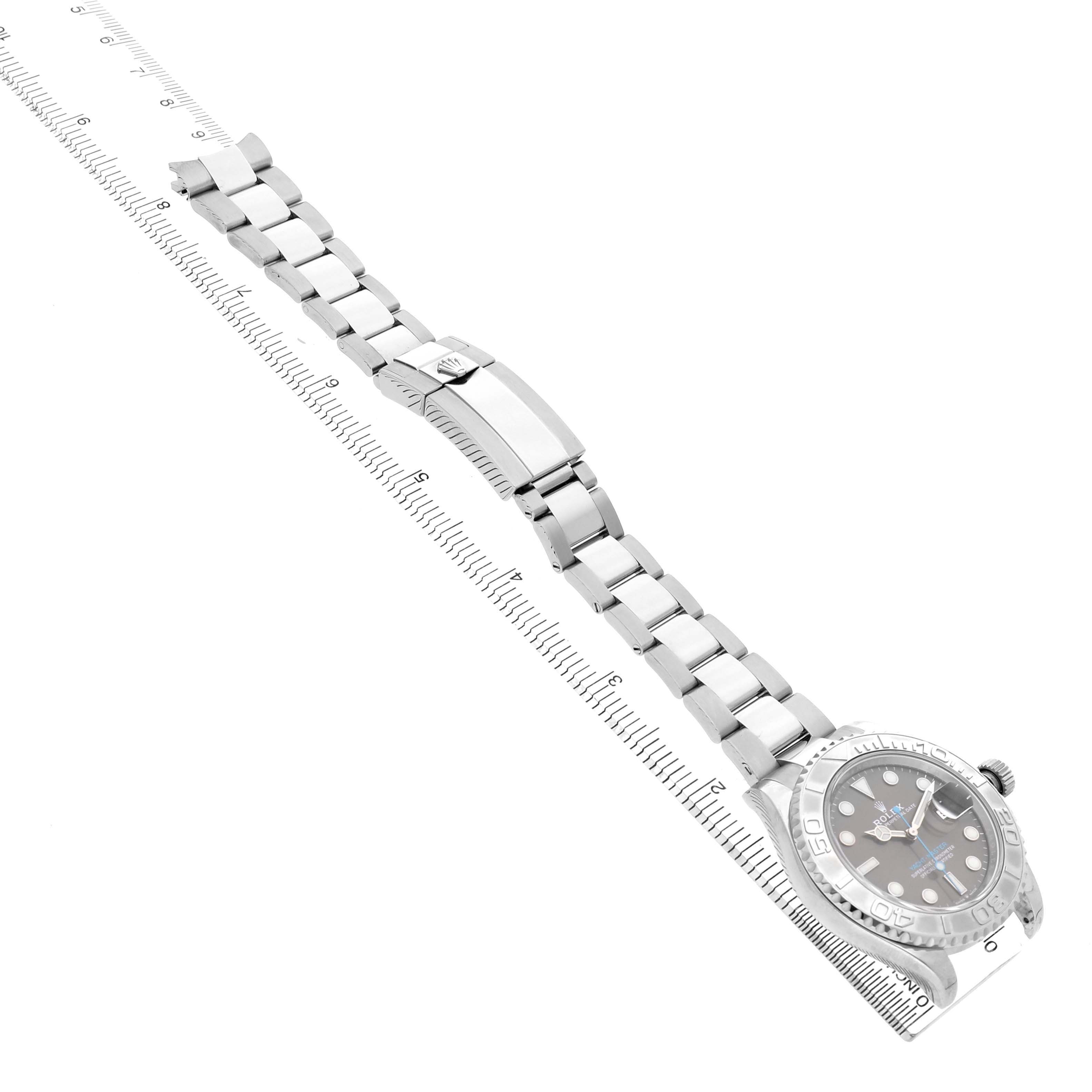 The image shows a Rolex Yacht-Master 126622 Men's Stainless Steel Grey Dial watch at an angled side view, displaying its face, bracelet, and clasp alongside a ruler.