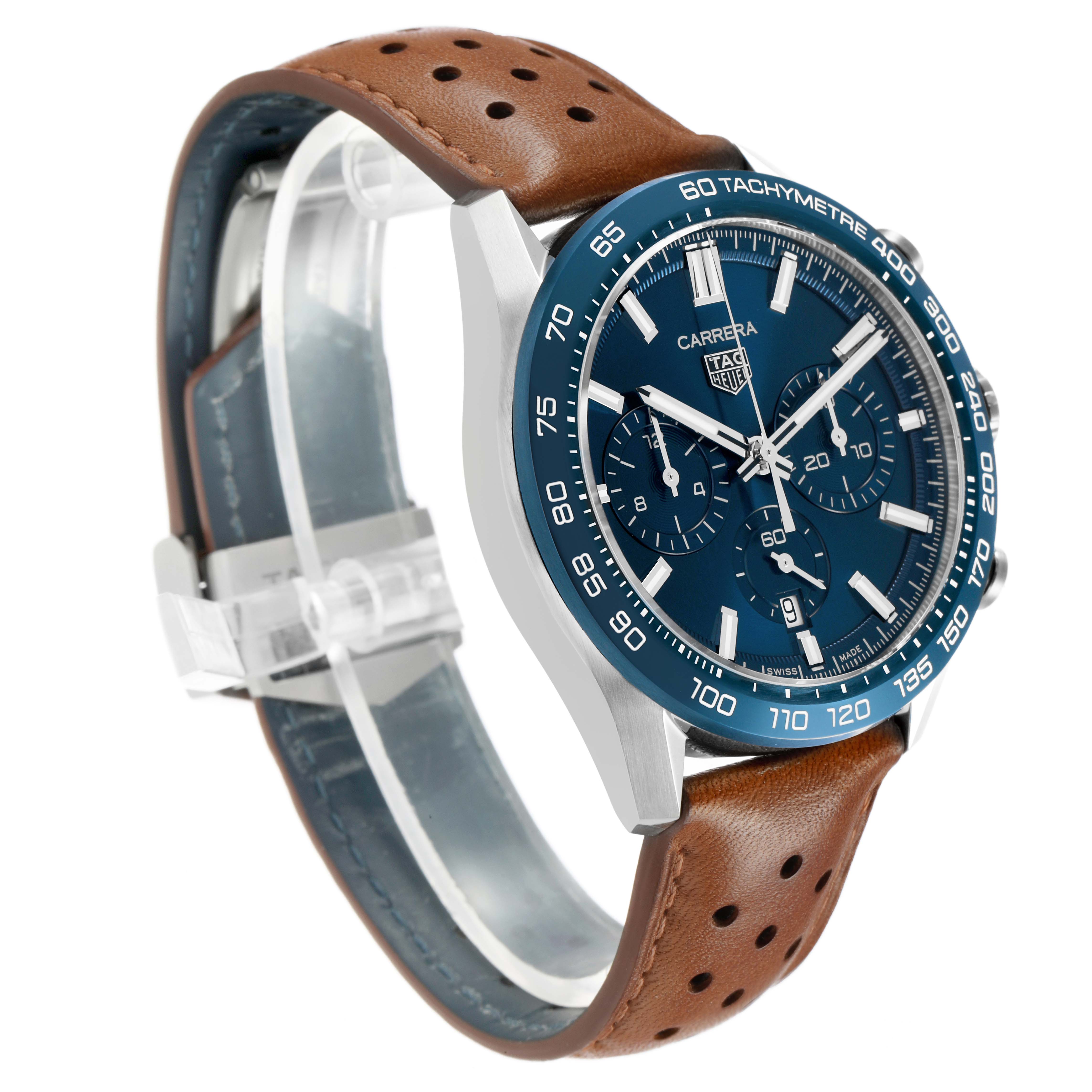 The Tag Heuer Carrera CBN2A1A Men's Stainless Steel Blue Dial watch is shown from a three-quarter angle, highlighting its blue dial, bezel, and brown leather strap.