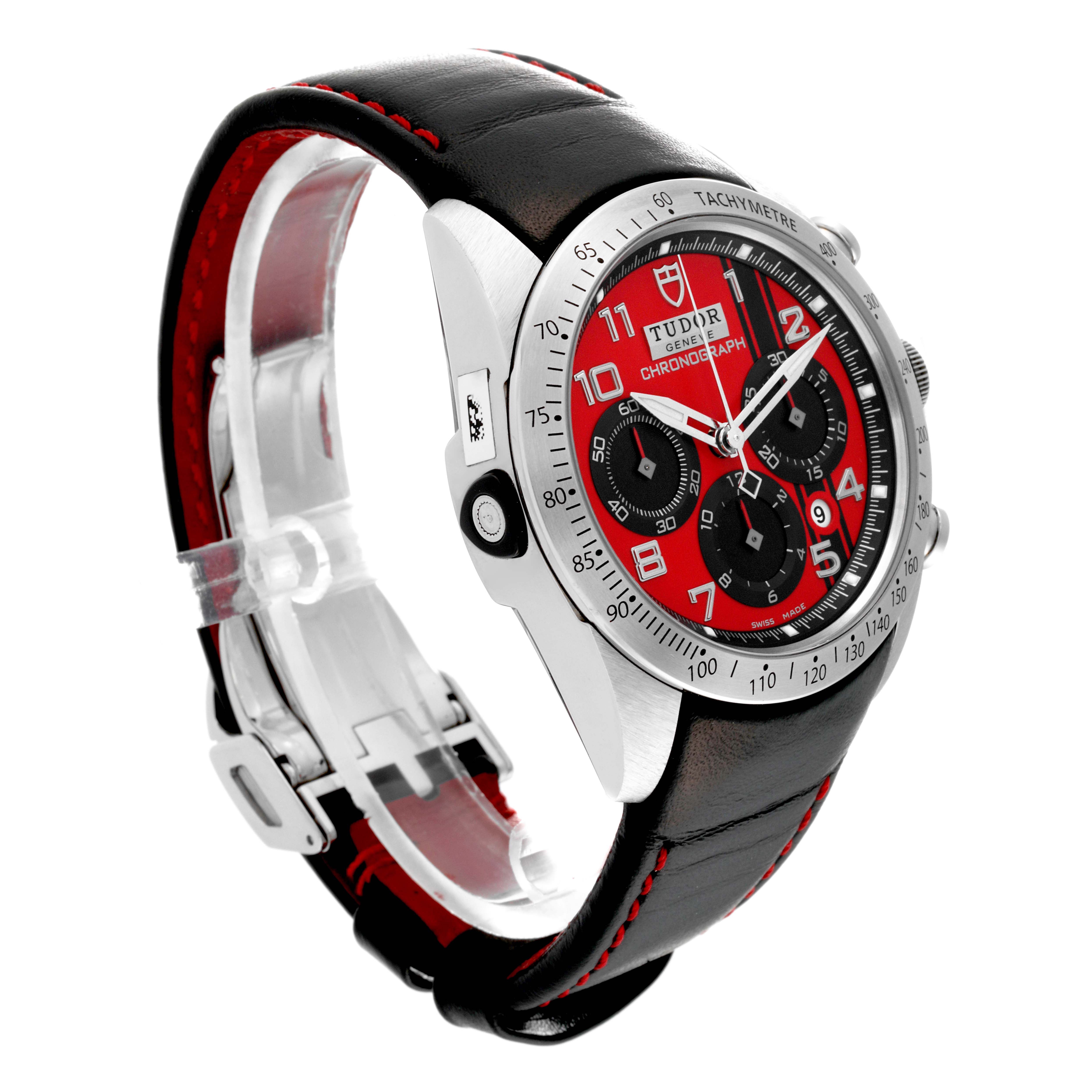The image shows the Tudor Fastrider 42000D Men's Stainless Steel Red Dial 42000D Men's Stainless Steel Red Dial watch from an angled side view, highlighting the black leather strap and the red chronograph dial.