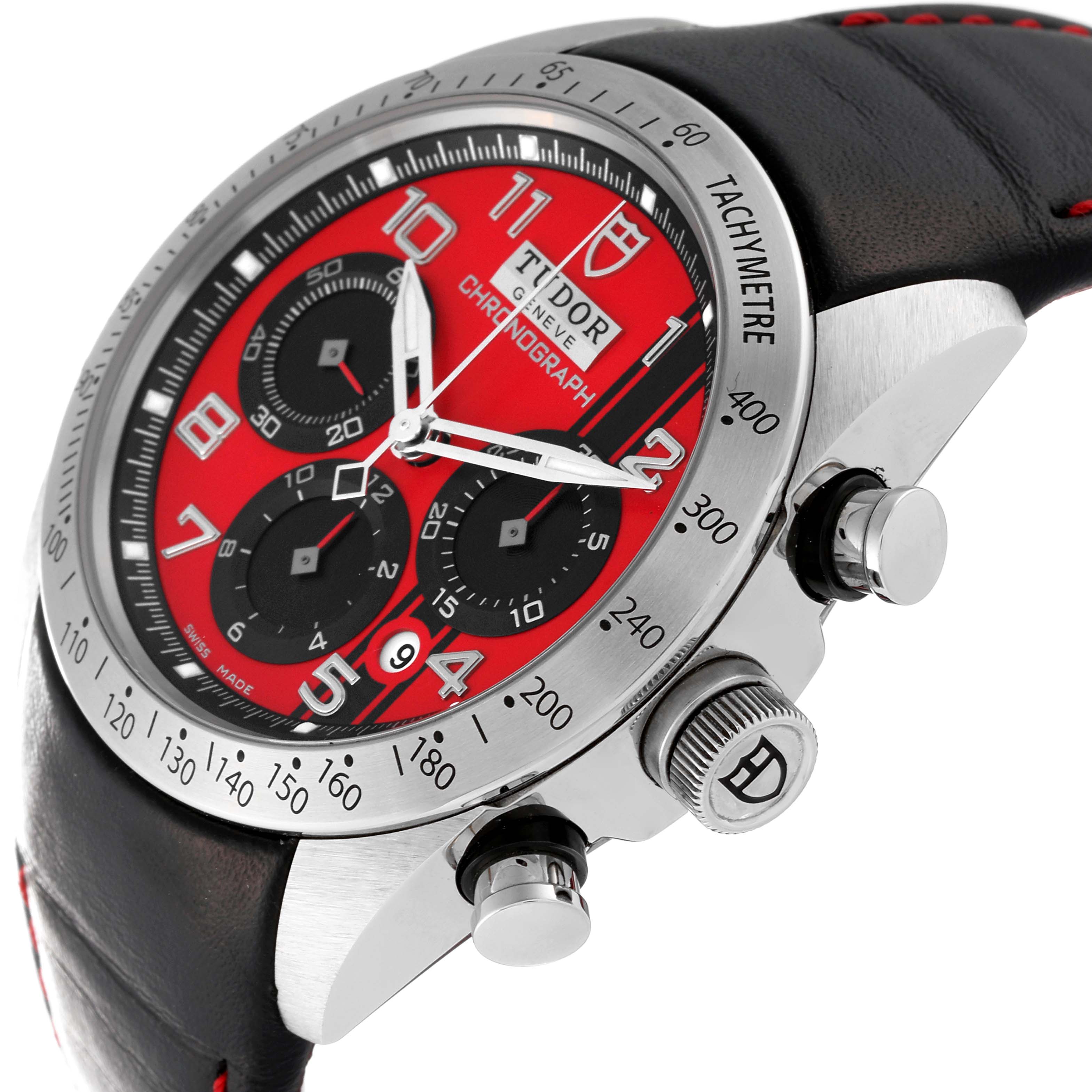 The image shows a close-up side view of the Tudor Fastrider 42000D Men's Stainless Steel Red Dial 42000D Men's Stainless Steel Red Dial watch, highlighting the red dial, chronograph subdials, bezel, and push-buttons.