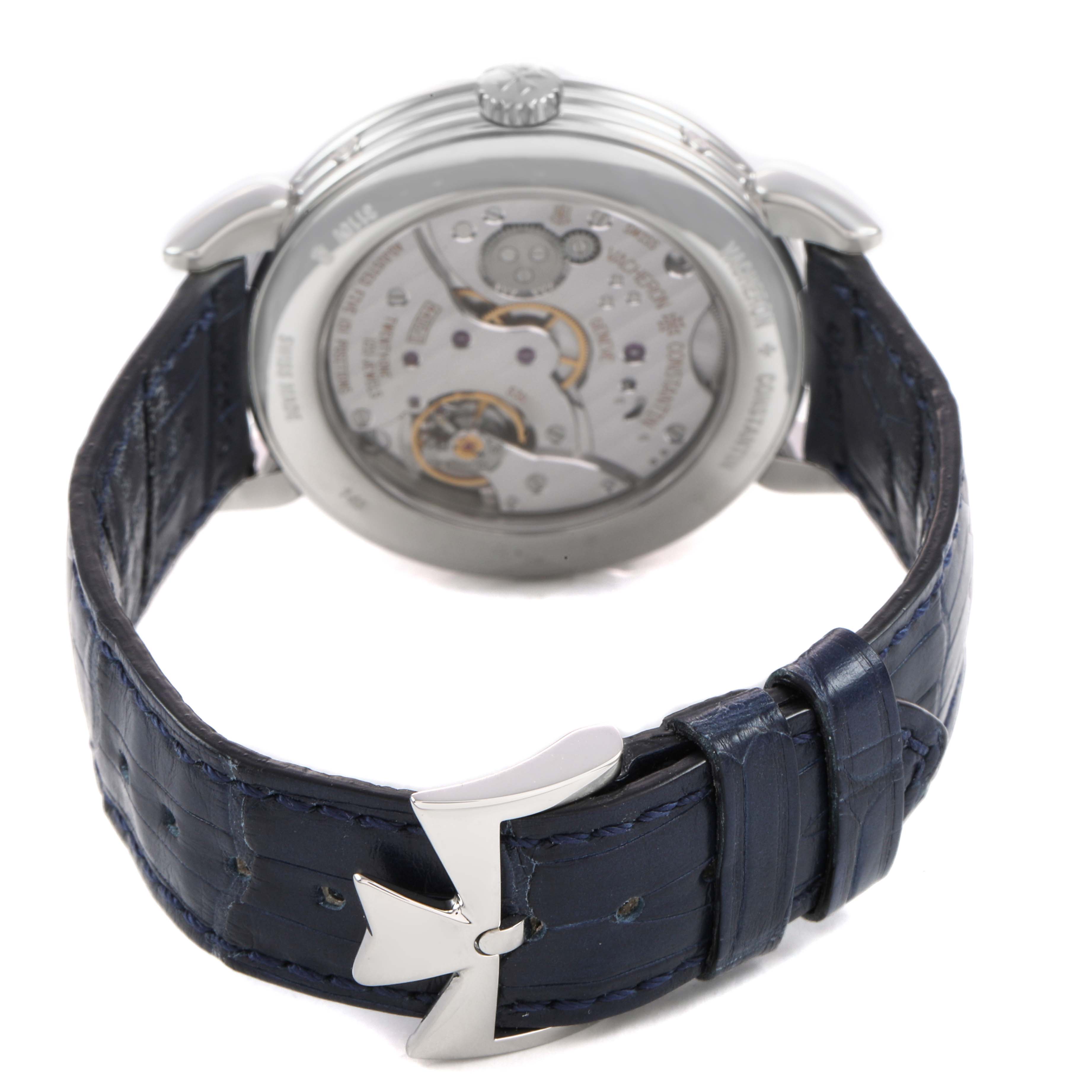 The Vacheron Constantin Historiques 3110V Men's Stainless Steel Silver Dial watch is shown from the back, highlighting the movement and clasp with its blue strap.