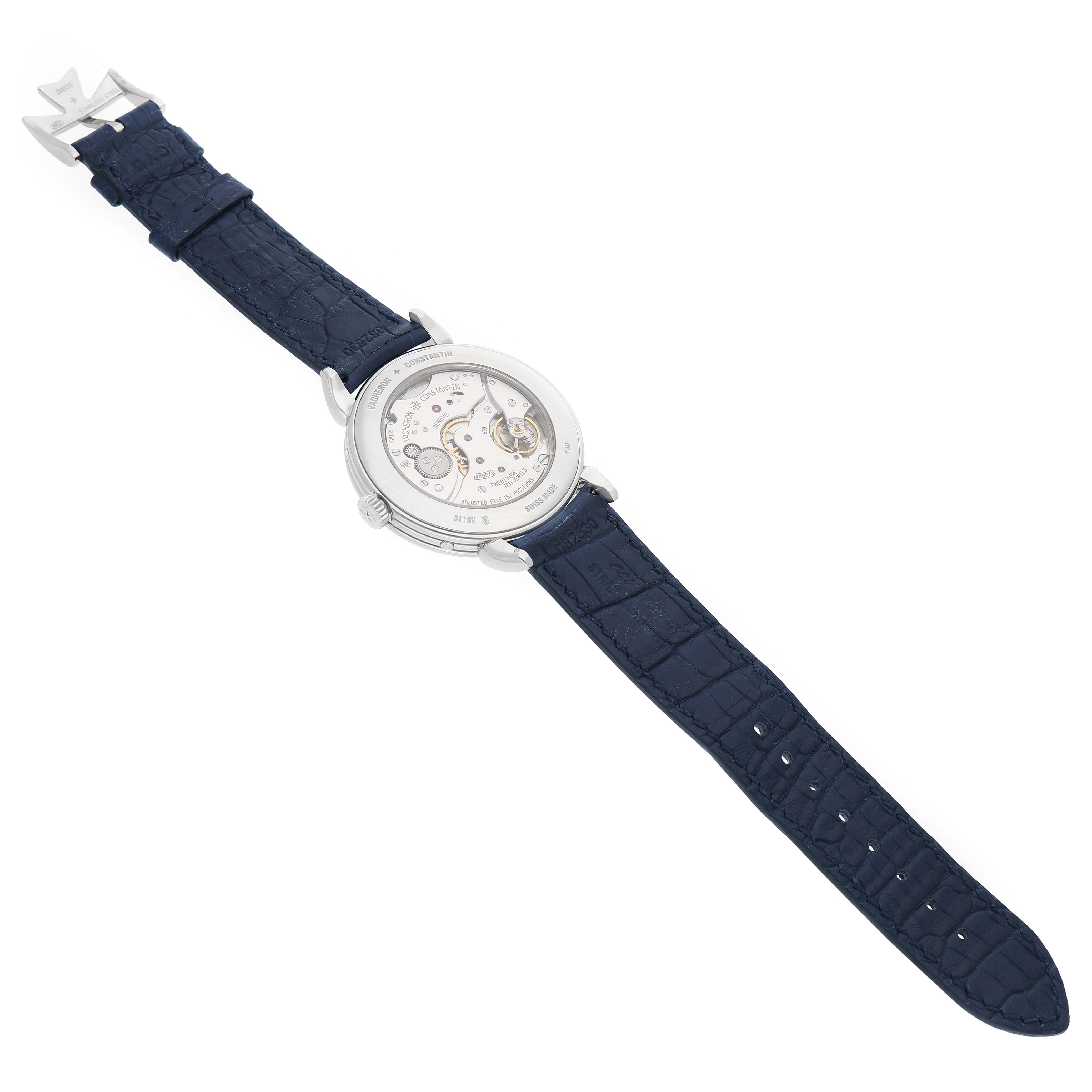 The Vacheron Constantin Historiques 3110V Men's Stainless Steel Silver Dial watch is shown from the back, displaying its movement and blue leather strap.