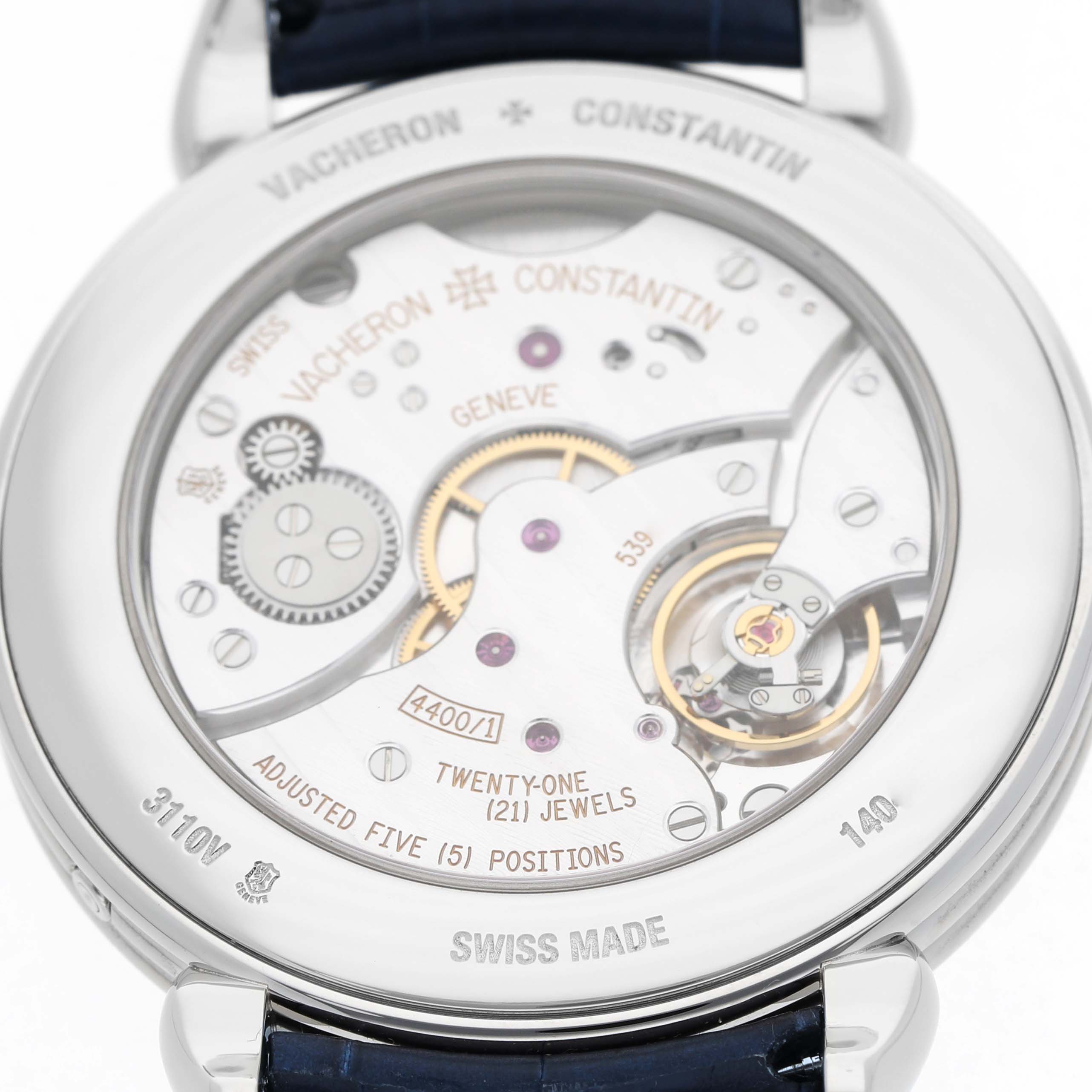 The image shows the back view of the Vacheron Constantin Historiques 3110V Men's Stainless Steel Silver Dial watch, highlighting its movement and inscriptions.
