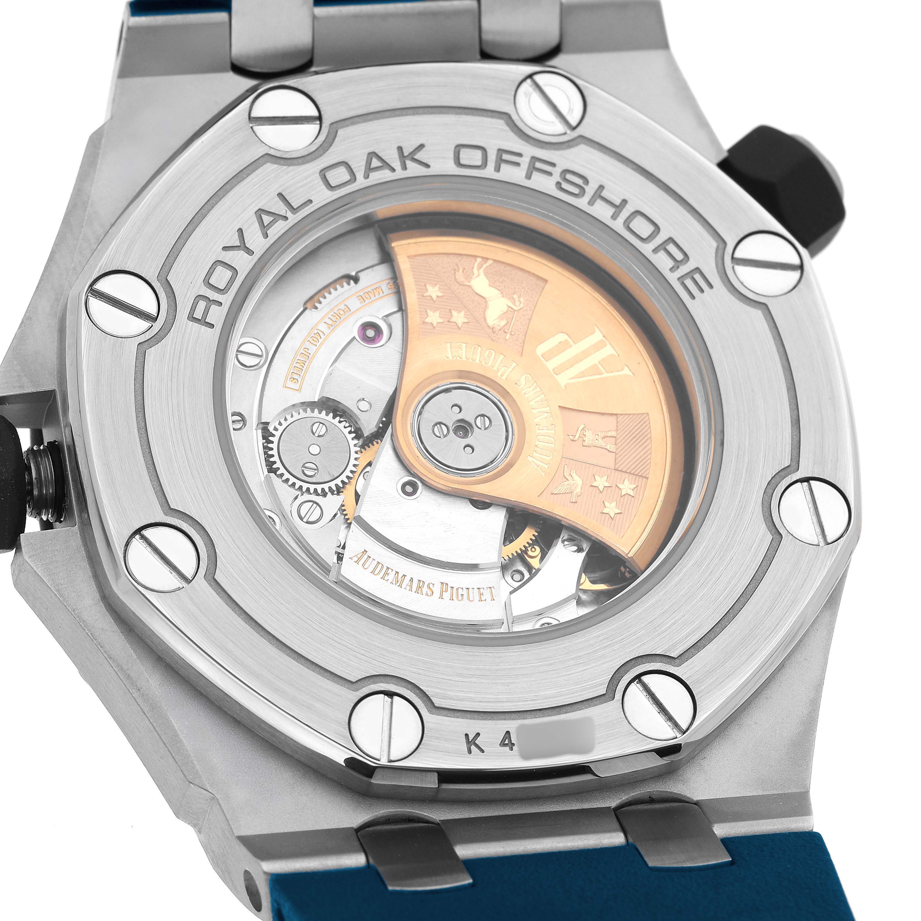 The image shows the back of the Audemars Piguet Royal Oak Offshore 15710ST.00.A027CA.01 Men's Stainless Steel Blue Dial, highlighting its movement and engraved rotor.