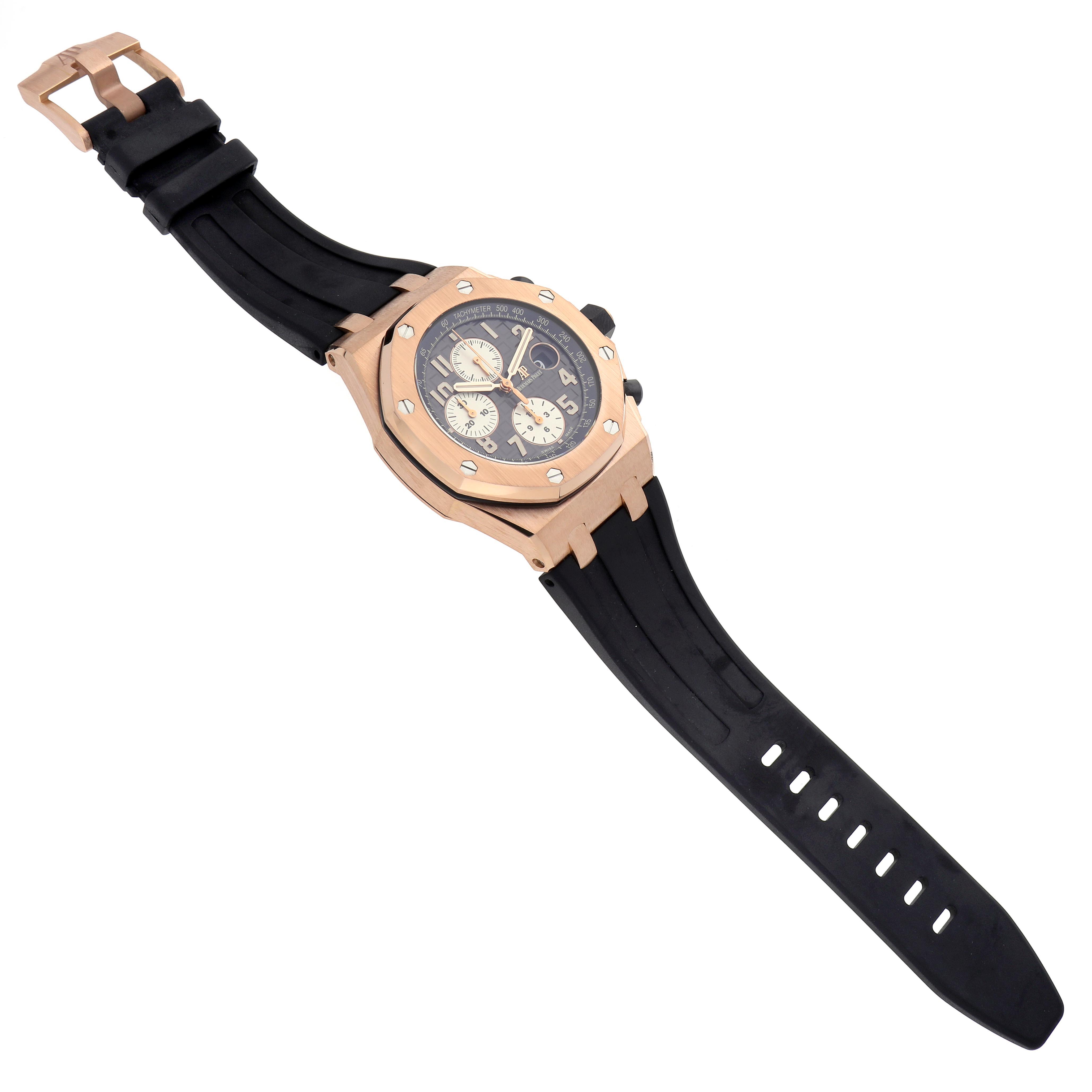 The Audemars Piguet Royal Oak Offshore 26470OR.OO.A125CR.01.A Men's Rose Gold Grey Dial 26470OR.OO.A125CR.01.A Men's Rose Gold Grey Dial watch is shown at an angled top view, displaying the face, bezel, and rubber strap.