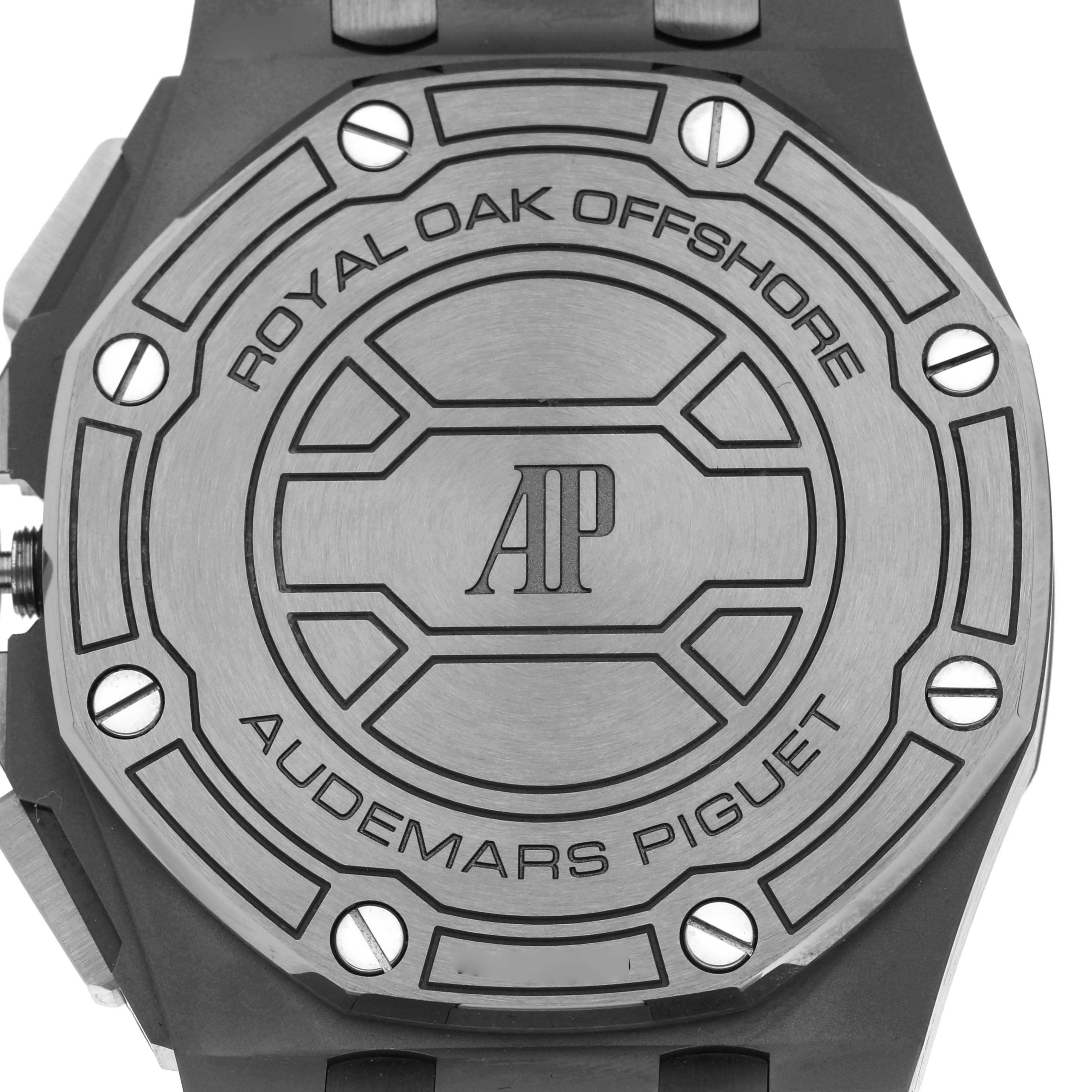 The image shows the back case of a Royal Oak Offshore by Audemars Piguet, featuring its logo and engraved text.