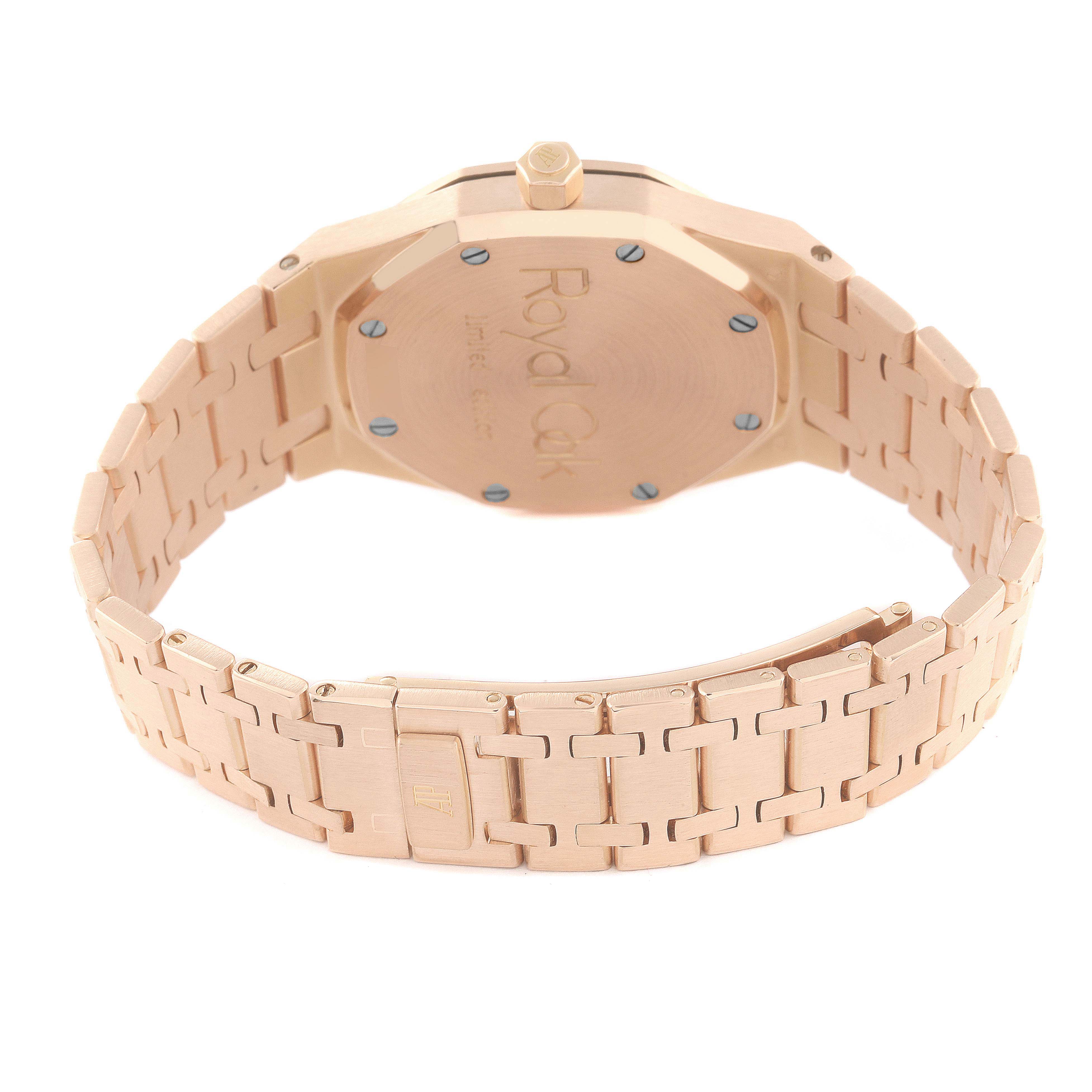 The image depicts the back view of the Audemars Piguet Royal Oak 15097OR.O.0789OR.01 Men's Rose Gold Silver Dial 15097OR.O.0789OR.01 Men's Rose Gold Silver Dial watch, showcasing its caseback, crown, and bracelet.