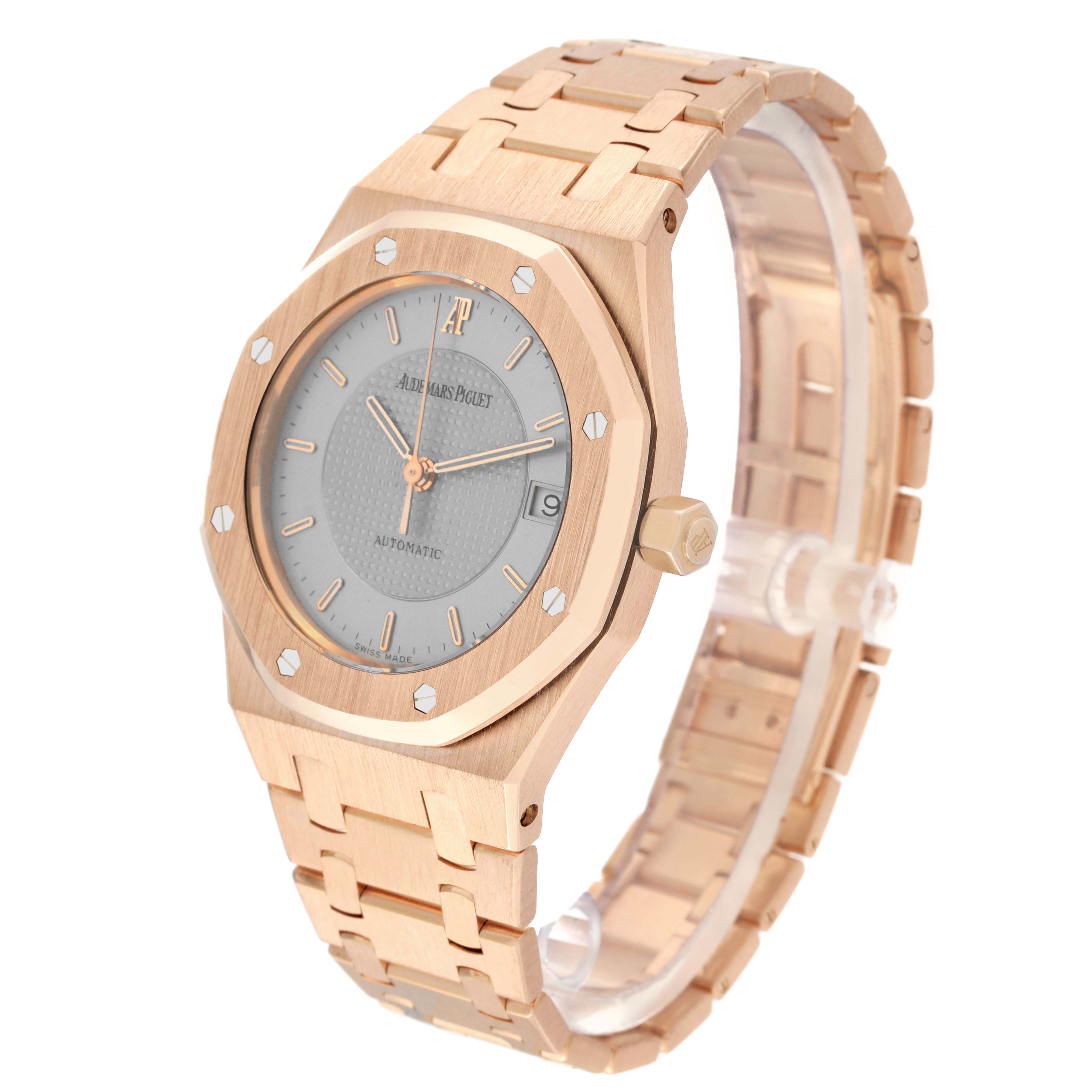 The image shows a Royal Oak by Audemars Piguet from a three-quarter angle, highlighting the face, bezel, and bracelet.