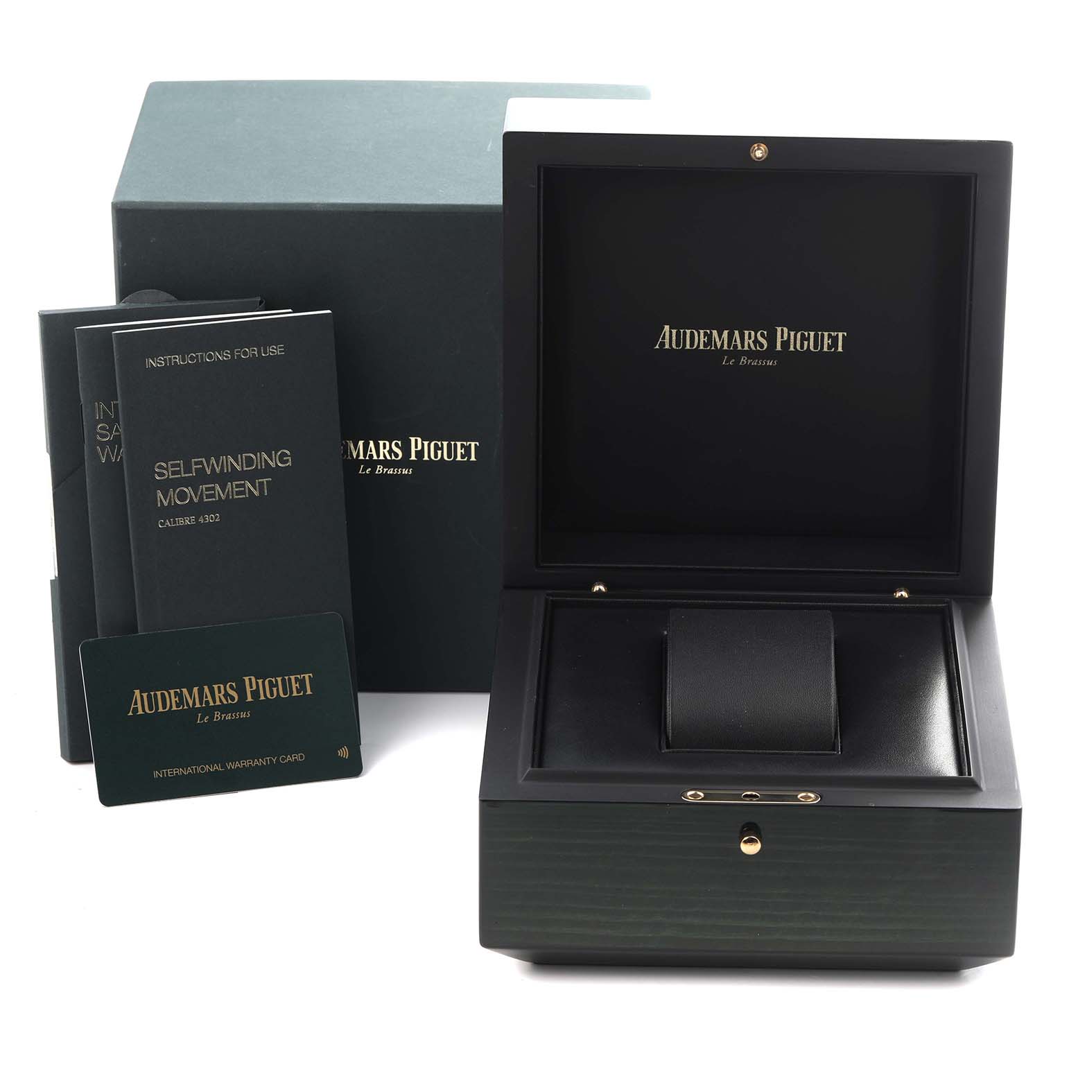 The image shows an open Audemars Piguet Royal Oak 15300ST.OO.1220ST.04 Men's Stainless Steel White Dial 15300ST.OO.1220ST.04 Men's Stainless Steel White Dial watch box, warranty card, and instruction manuals.