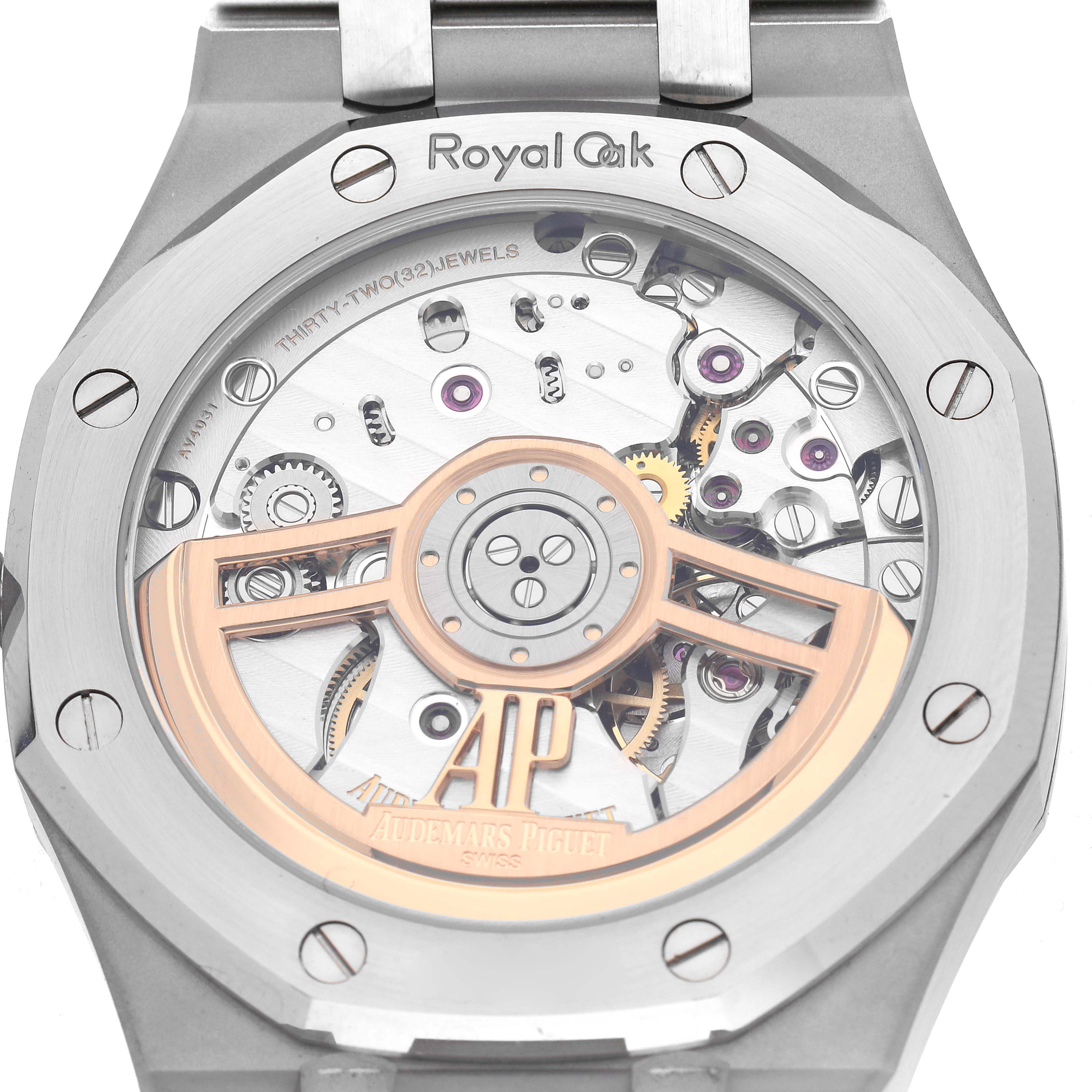 The image shows the back of an Audemars Piguet Royal Oak 15300ST.OO.1220ST.04 Men's Stainless Steel White Dial 15300ST.OO.1220ST.04 Men's Stainless Steel White Dial watch, revealing the movement and rotor.