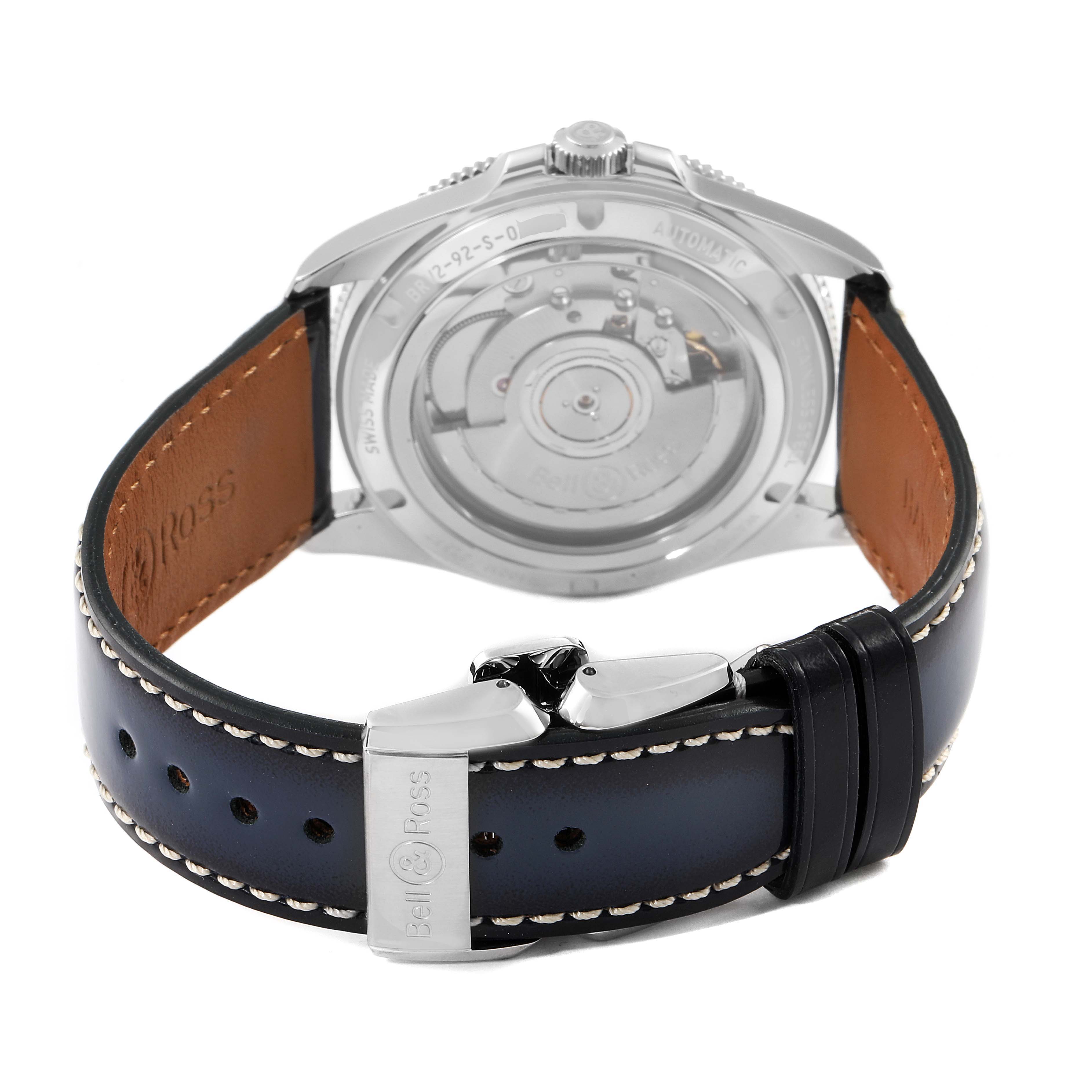The image shows the rear view of a Bell & Ross Heritage BRV292-BU-G-ST/SCA Men's Stainless Steel Blue Dial BRV292-BU-G-ST/SCA Men's Stainless Steel Blue Dial watch, highlighting the case back, movement, and leather strap with the clasp.