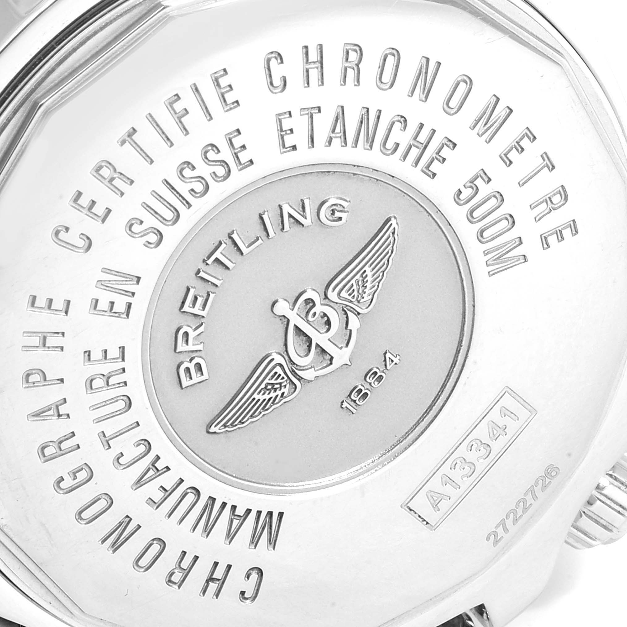 This is a close-up of the back casing of a Breitling Superocean A13341C3/BD19 Men's Stainless Steel Black Dial A13341C3/BD19 Men's Stainless Steel Black Dial watch, showing engravings and brand insignia.