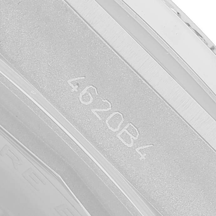 The image shows a close-up of the engraved serial number on the side of a Breitling A77310591A1A1 Women's Stainless Steel Silver Dial Chronomat 32 Silver Diamond Steel Ladies Watch A77310.