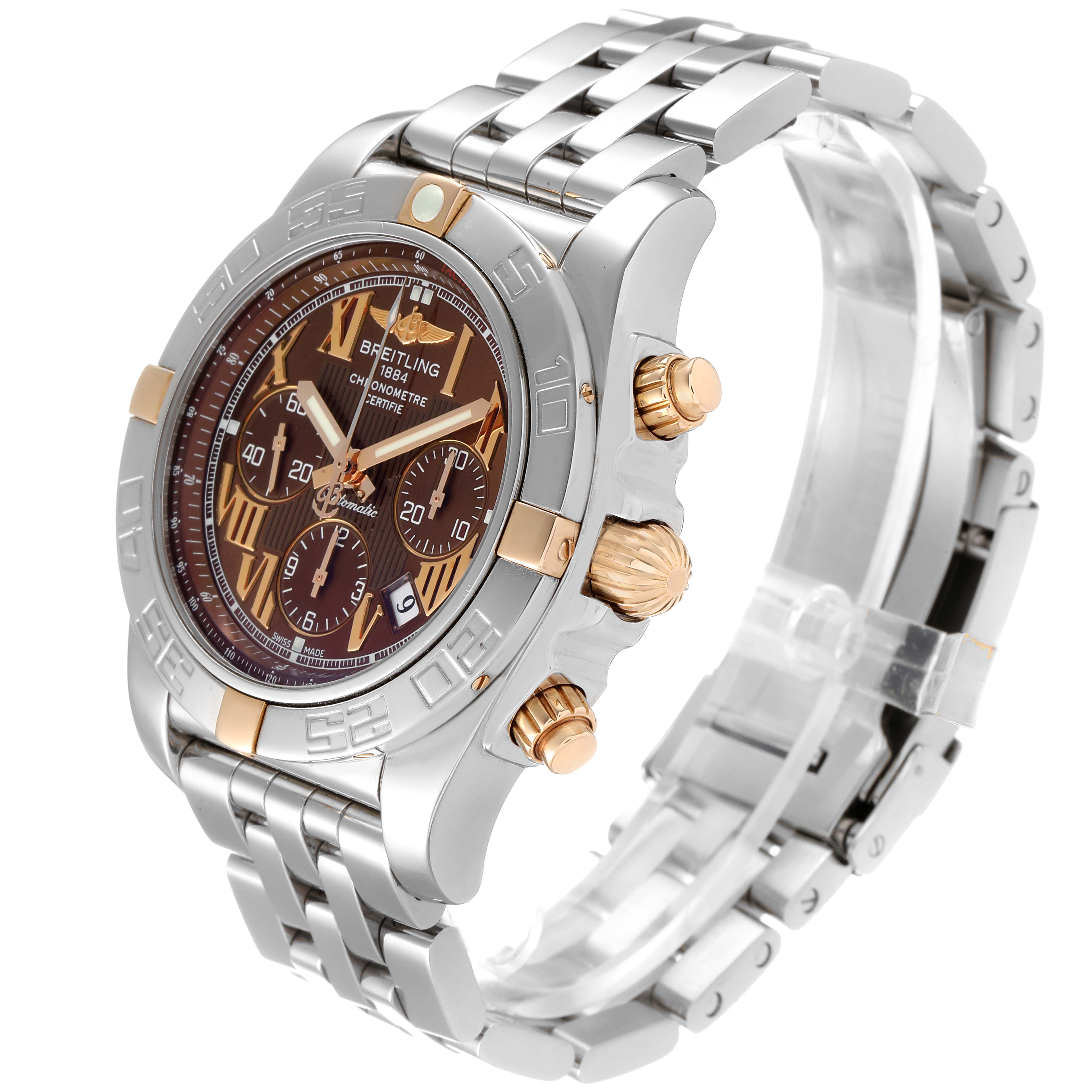 The image shows a Breitling Chronomat IB0110 Men
s Stainless Steel Brown Dial IB0110 Men
s Stainless Steel Brown Dial watch at an oblique angle, highlighting its face, crown, chronograph buttons, and metal bracelet.