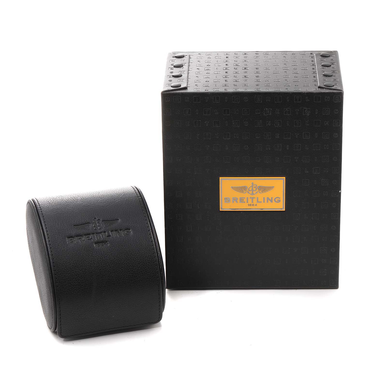 The image shows the packaging for a Breitling Chronomat IB0110 Men
s Stainless Steel Brown Dial IB0110 Men
s Stainless Steel Brown Dial watch, including a black box and a black leather case.