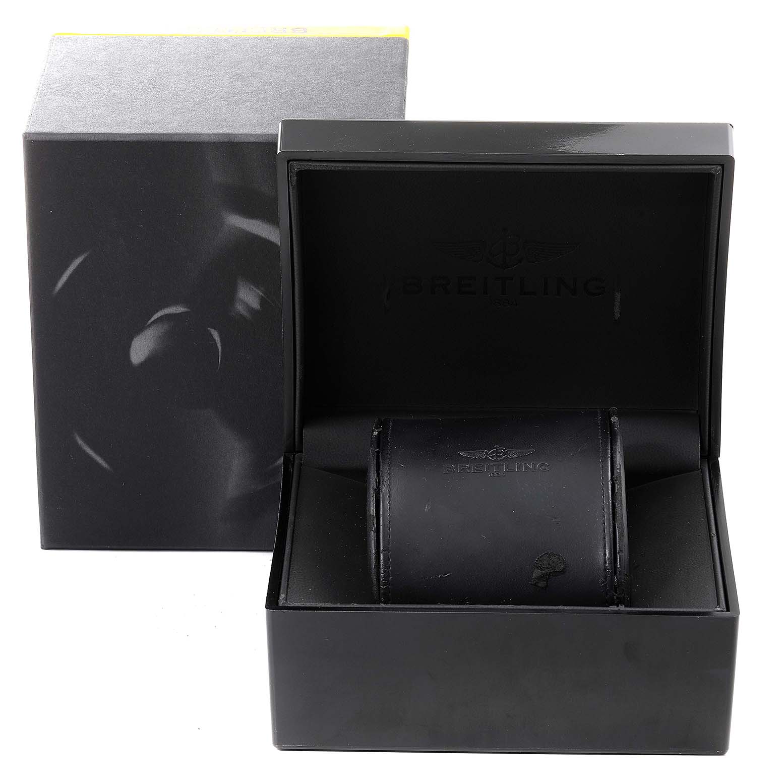 The image shows the packaging box for a Breitling Superocean U2337012/BB81-435X Men's Steel and Gold (two tone) Black Dial U2337012/BB81-435X Men's Steel and Gold (two tone) Black Dial watch, including a pillow for securing the watch, from a front angle.