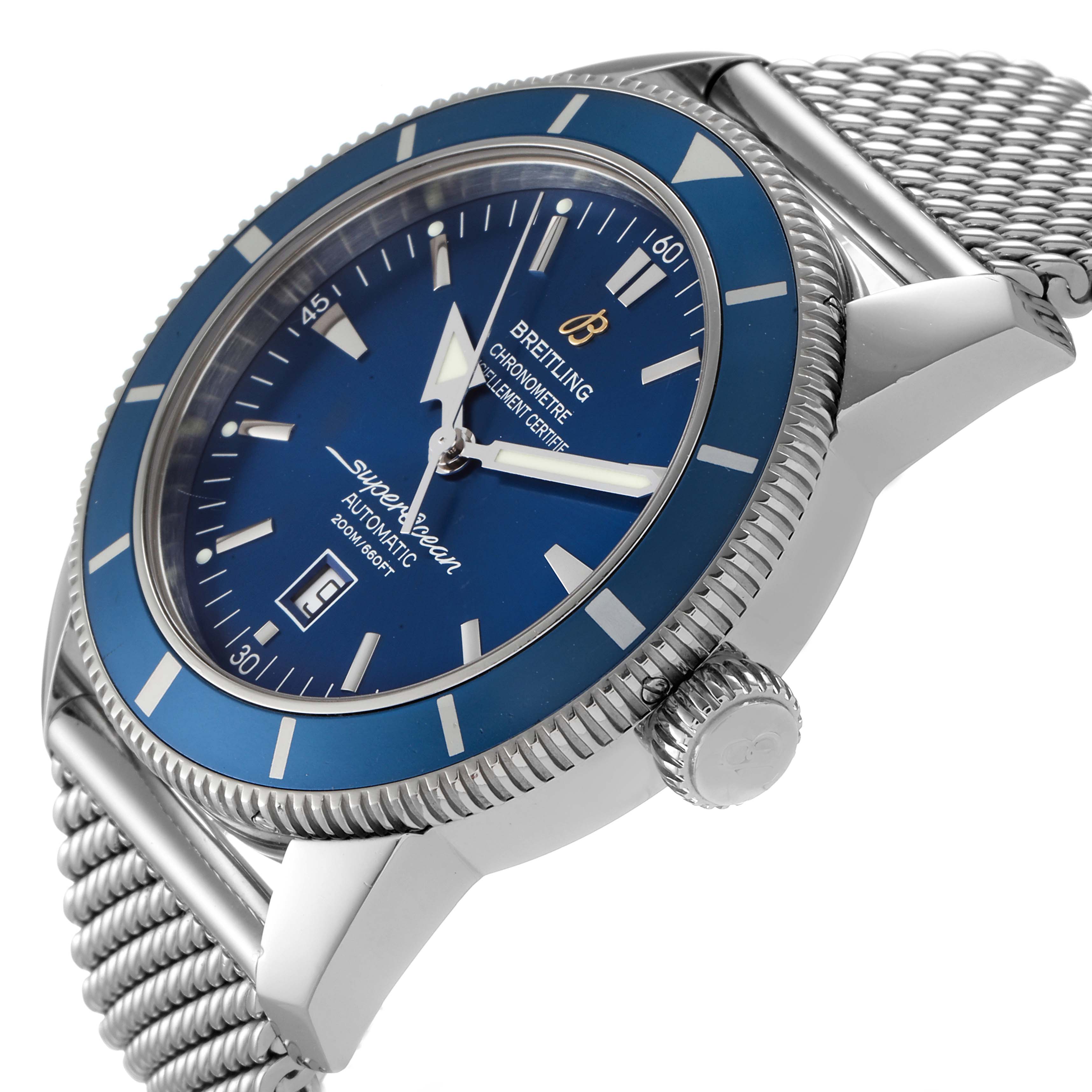 The image shows a side angle of a Breitling Superocean A17320 Men
s Stainless Steel Blue Dial A17320 Men
s Stainless Steel Blue Dial watch, highlighting its face, bezel, crown, and part of the mesh bracelet.