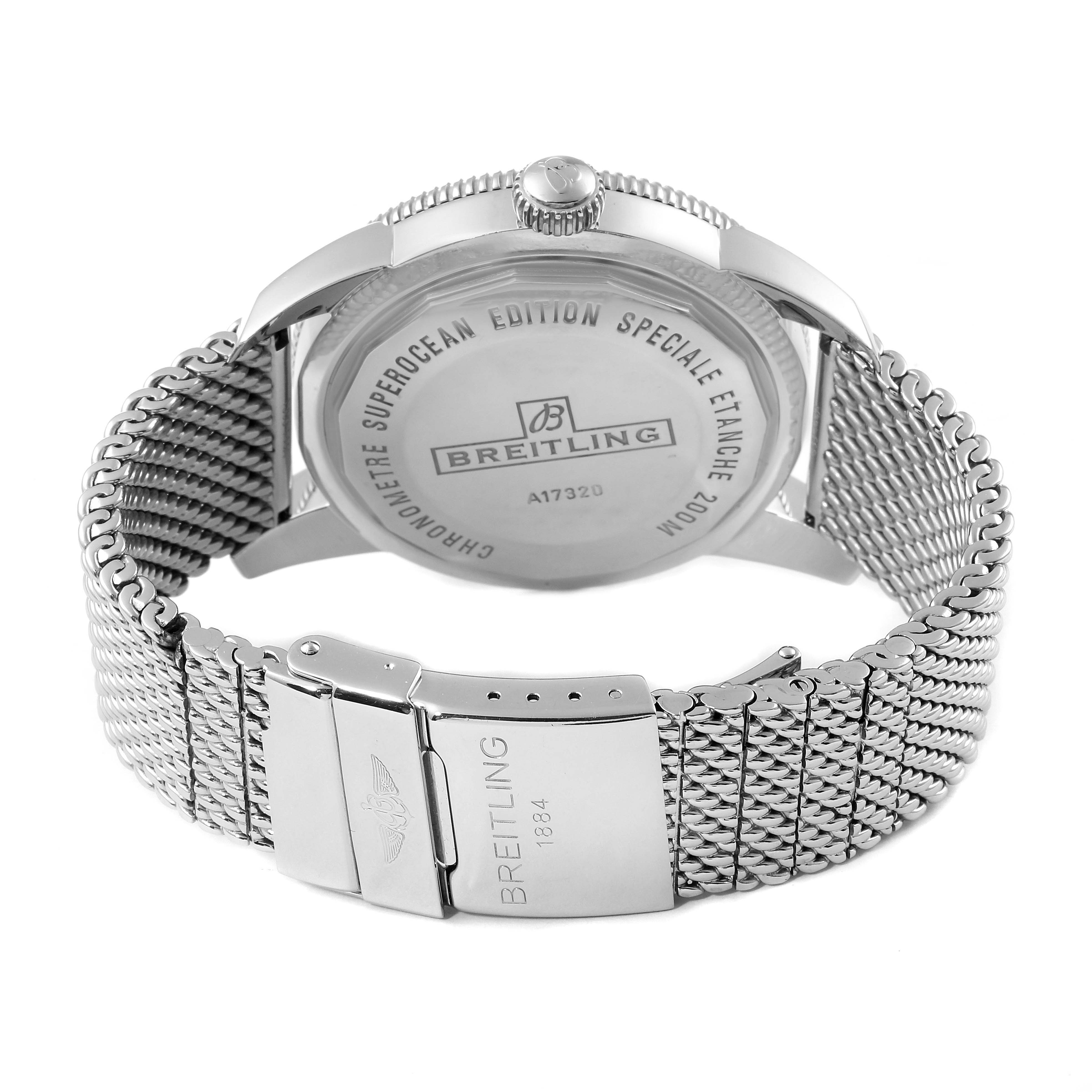 The image shows the back view of a Breitling Superocean A17320 Men
s Stainless Steel Blue Dial A17320 Men
s Stainless Steel Blue Dial watch, highlighting the case back and metal mesh bracelet.