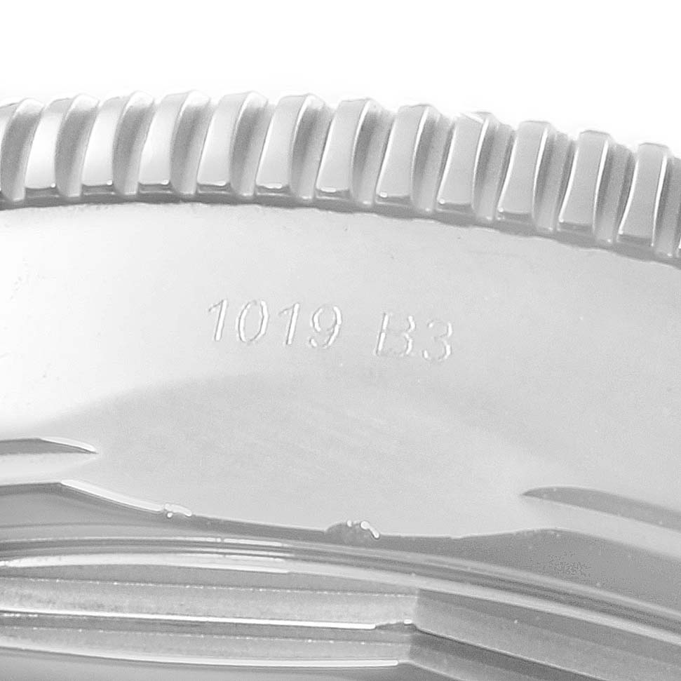 The image shows a close-up view of the bezel and case side of a Breitling Superocean AB2010161C1A1 Men's Stainless Steel Black Dial AB2010161C1A1 Men's Stainless Steel Black Dial watch, including engraved markings "1019 B3."