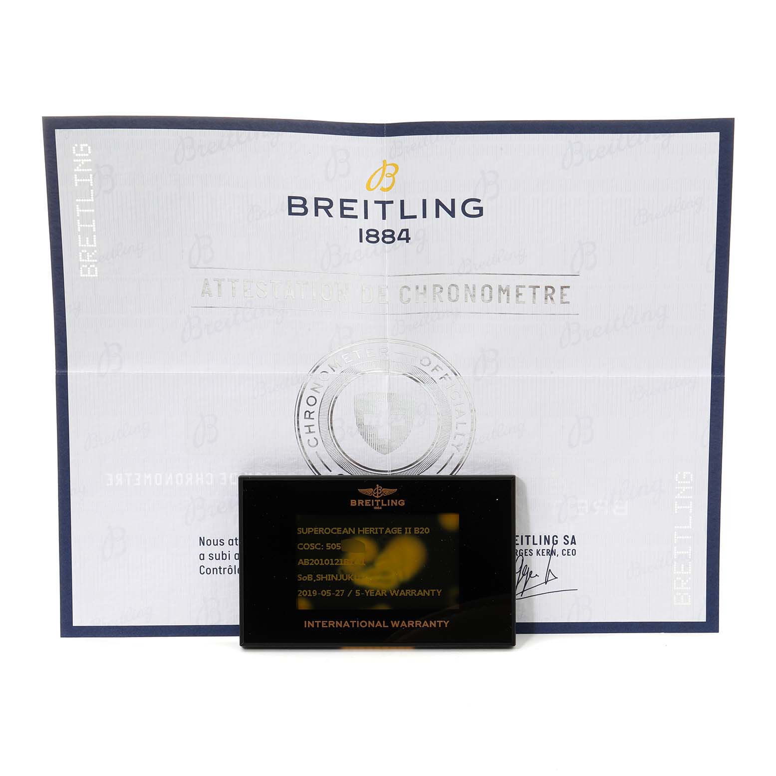 The image shows the certificate and international warranty card for the Breitling Superocean AB2010161C1A1 Men's Stainless Steel Black Dial AB2010161C1A1 Men's Stainless Steel Black Dial Heritage II B20 model.