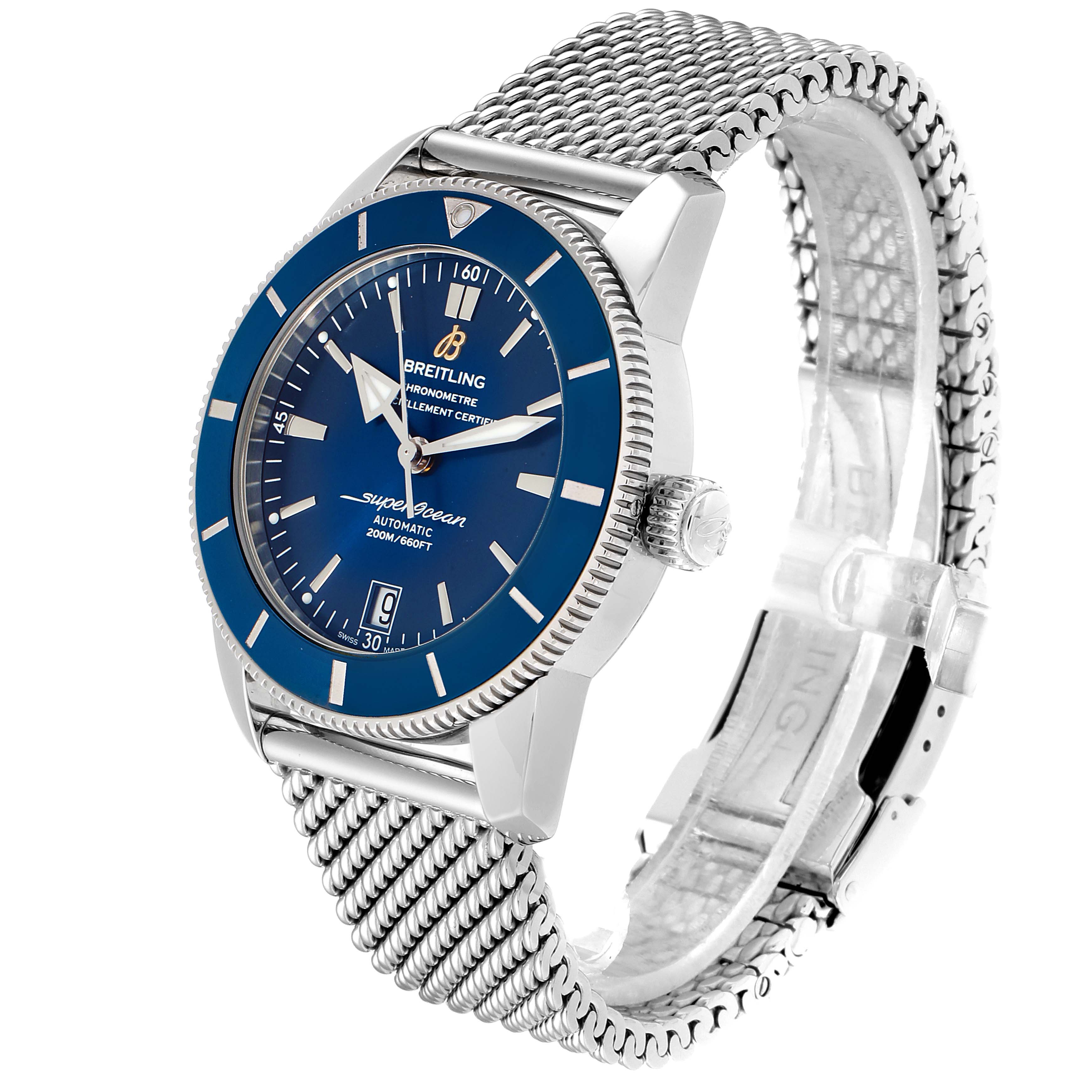 The Breitling Superocean AB2010161C1A1 Men's Stainless Steel Blue Dial AB2010161C1A1 Men's Stainless Steel Blue Dial watch is shown at a three-quarter angle, displaying its face, mesh strap, crown, and date window.