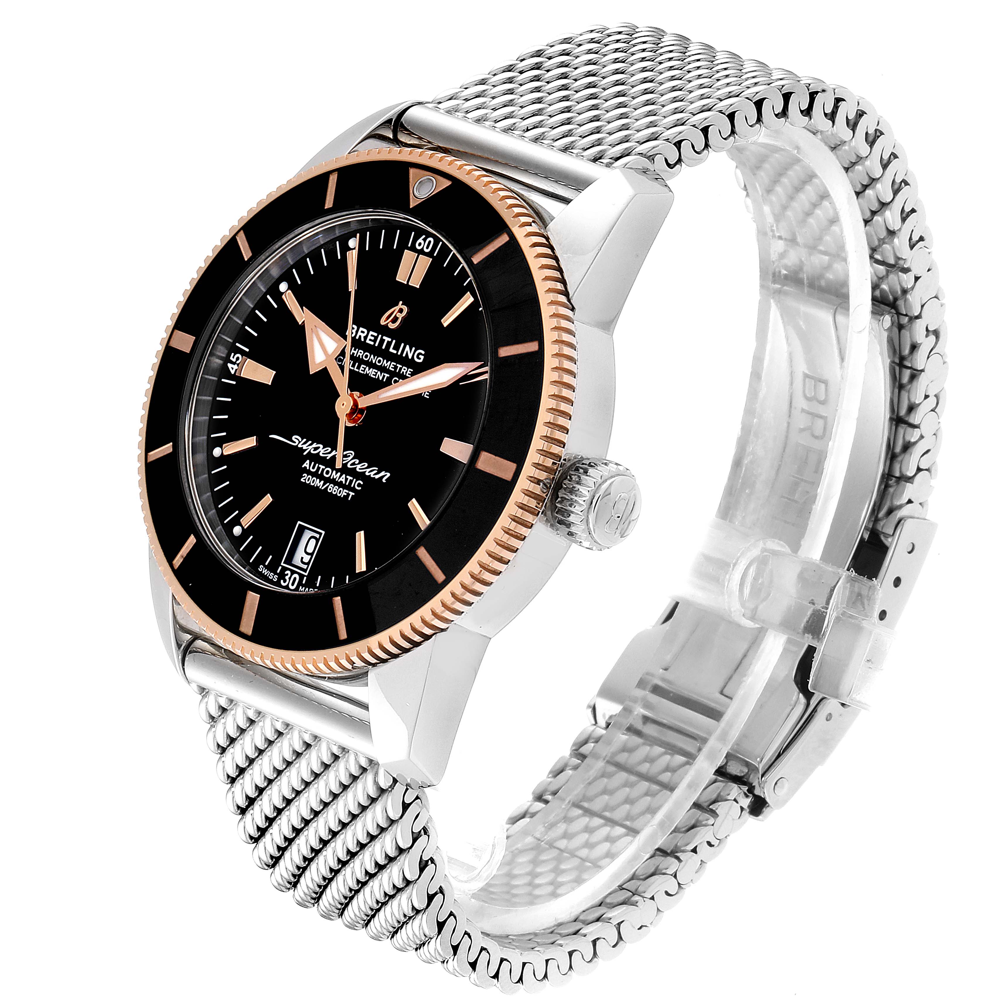The Breitling Superocean UB201012/BG53/154A Men
s Stainless Steel Black Dial UB201012/BG53/154A Men
s Stainless Steel Black Dial watch is shown at a three-quarter angle, displaying the face, bezel, crown, and mesh band.