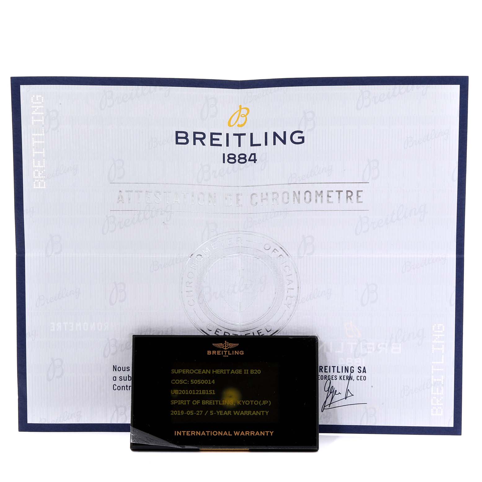 The image shows the warranty card and chronometer certification paper for the Breitling Superocean UB201012/BG53/154A Men
s Stainless Steel Black Dial UB201012/BG53/154A Men
s Stainless Steel Black Dial model.