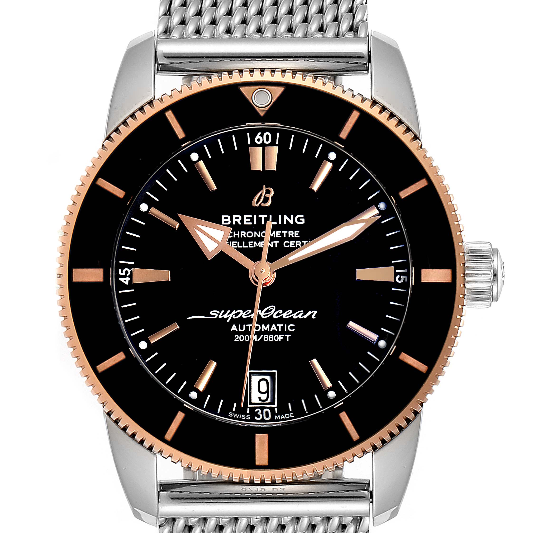 The Breitling Superocean UB201012/BG53/154A Men
s Stainless Steel Black Dial UB201012/BG53/154A Men
s Stainless Steel Black Dial watch is shown from a front angle, highlighting its black dial, rose-gold bezel, and mesh bracelet.