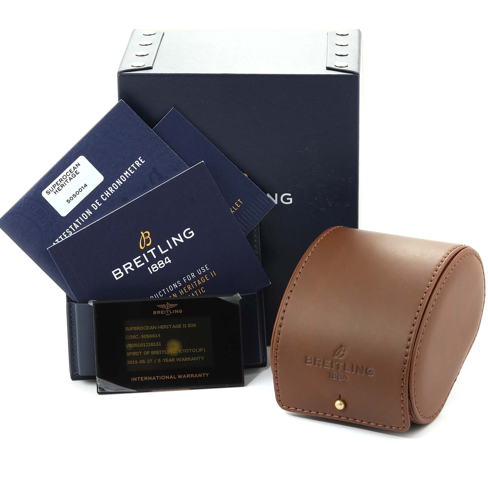 The Breitling Superocean UB201012/BG53/154A Men
s Stainless Steel Black Dial UB201012/BG53/154A Men
s Stainless Steel Black Dial accessories shown include a storage box, manuals, warranty card, and a brown leather travel case.