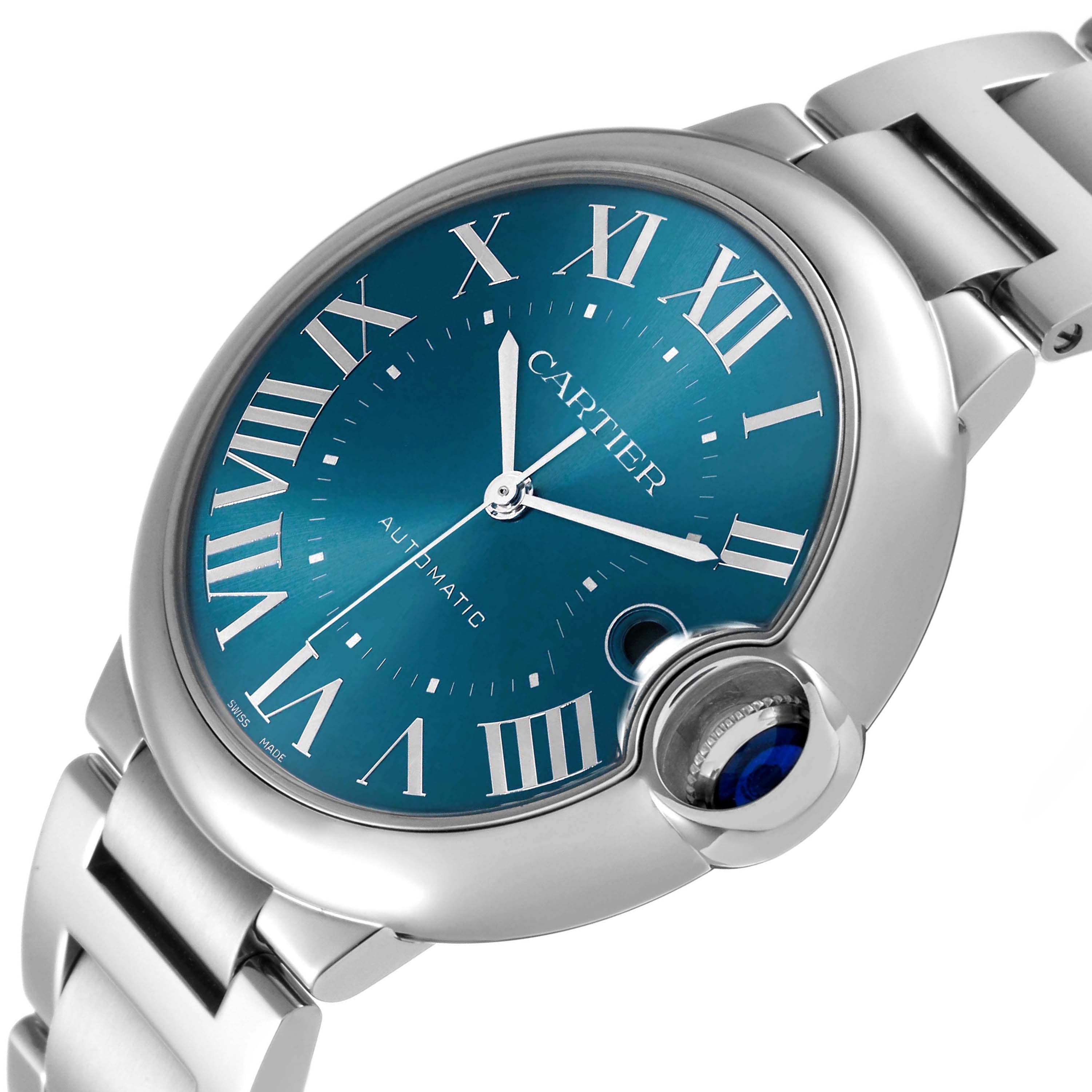 The Cartier Ballon Bleu WSBB0061 Men's Stainless Steel Blue Dial watch is shown at an angle highlighting the blue dial, Roman numerals, and crown with a blue cabochon.