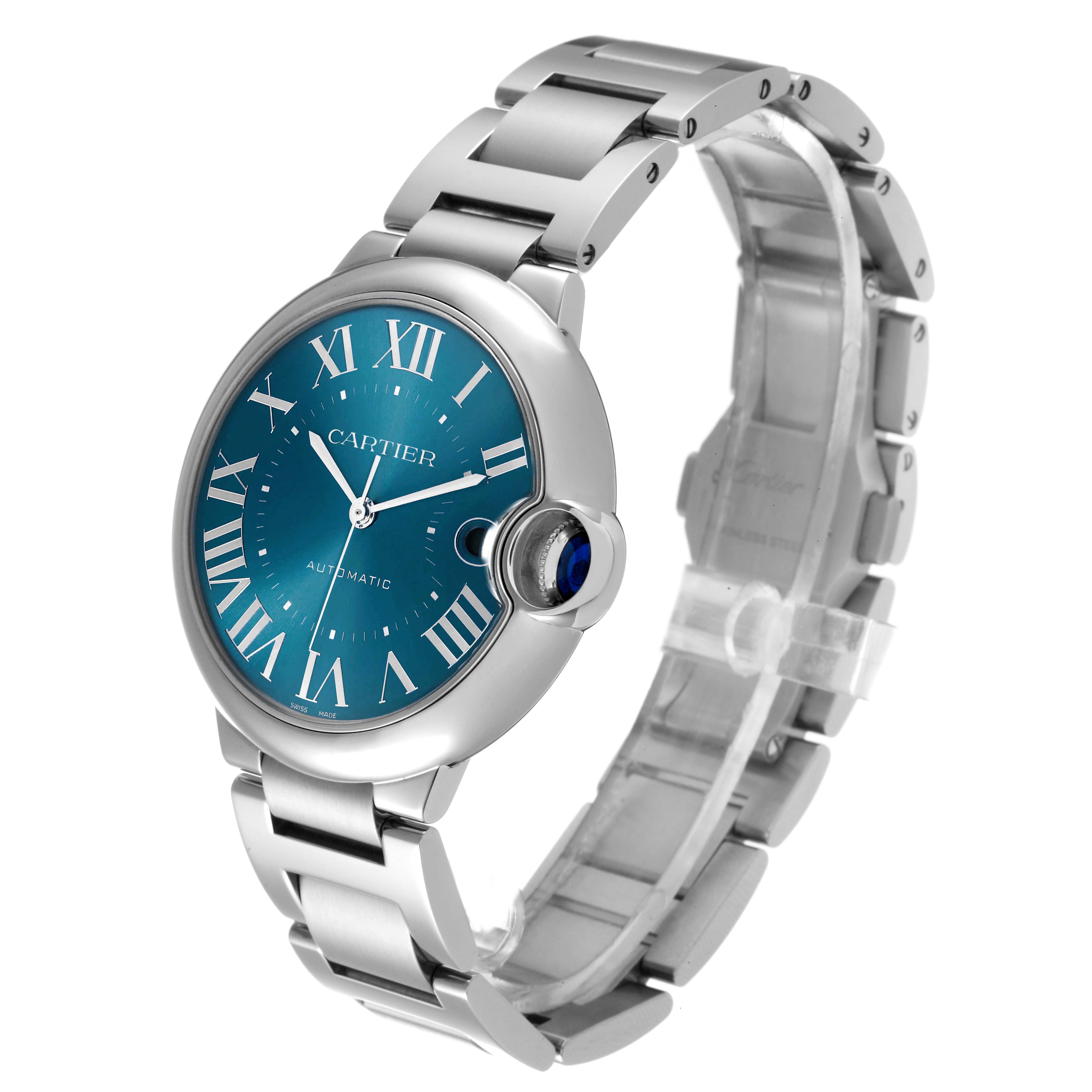 The Cartier Ballon Bleu WSBB0061 Men's Stainless Steel Blue Dial watch is shown at a three-quarter angle, highlighting the blue dial, Roman numerals, and stainless steel bracelet.