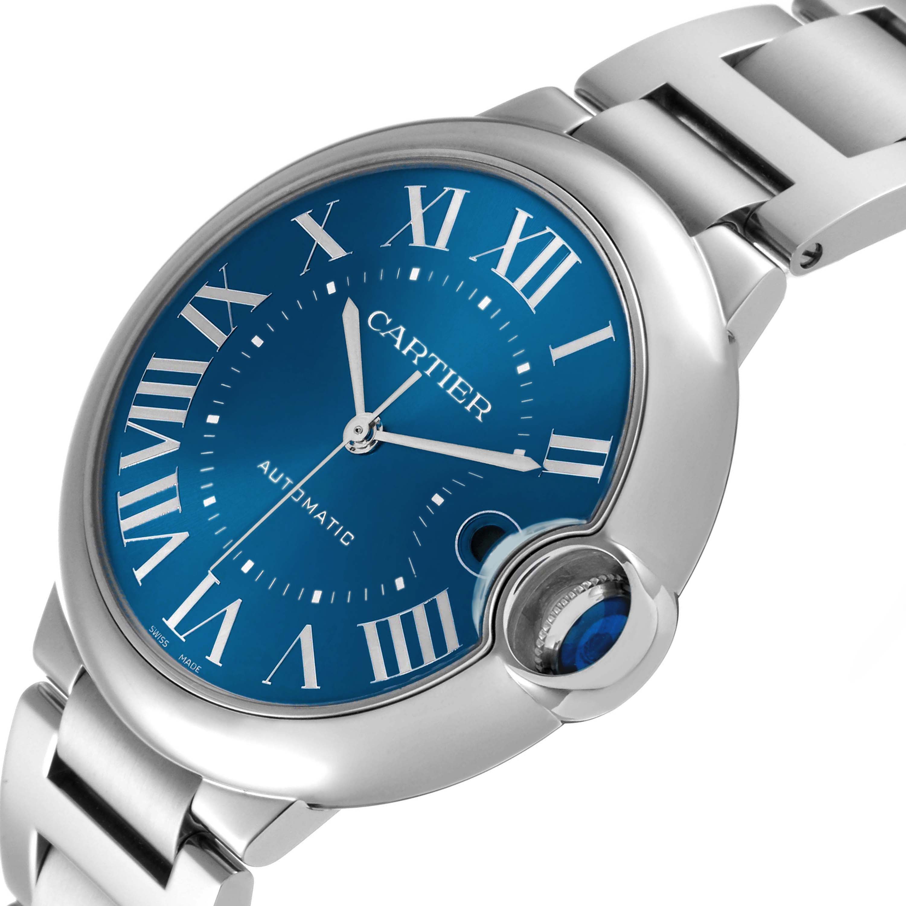The Cartier Ballon Bleu WSBB0061 Men's Stainless Steel Blue Dial watch is shown at an oblique angle, highlighting the blue dial, Roman numerals, and crown.