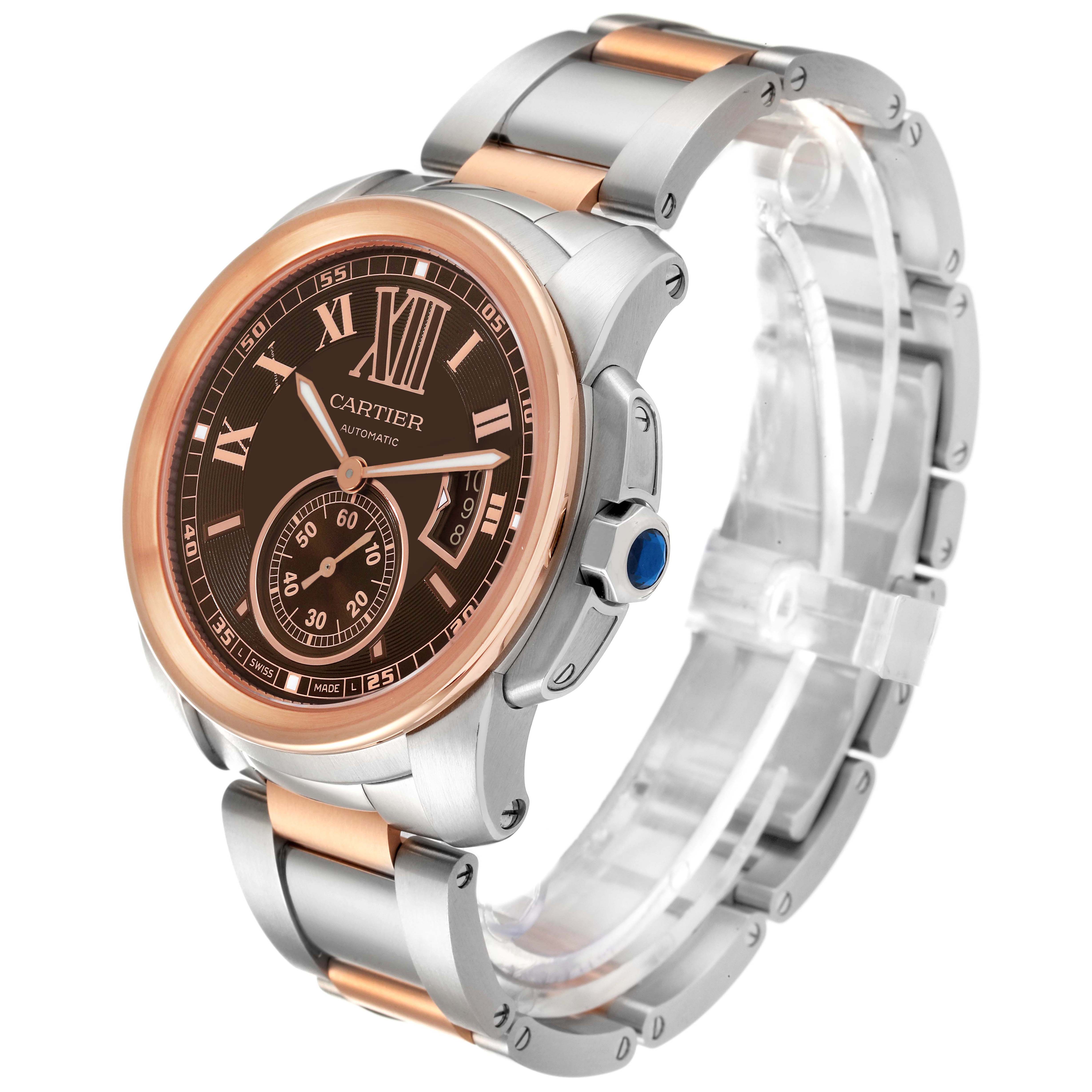 This image shows a Calibre de Cartier watch by Cartier from an angled side view, highlighting the dial, bezel, and bracelet.