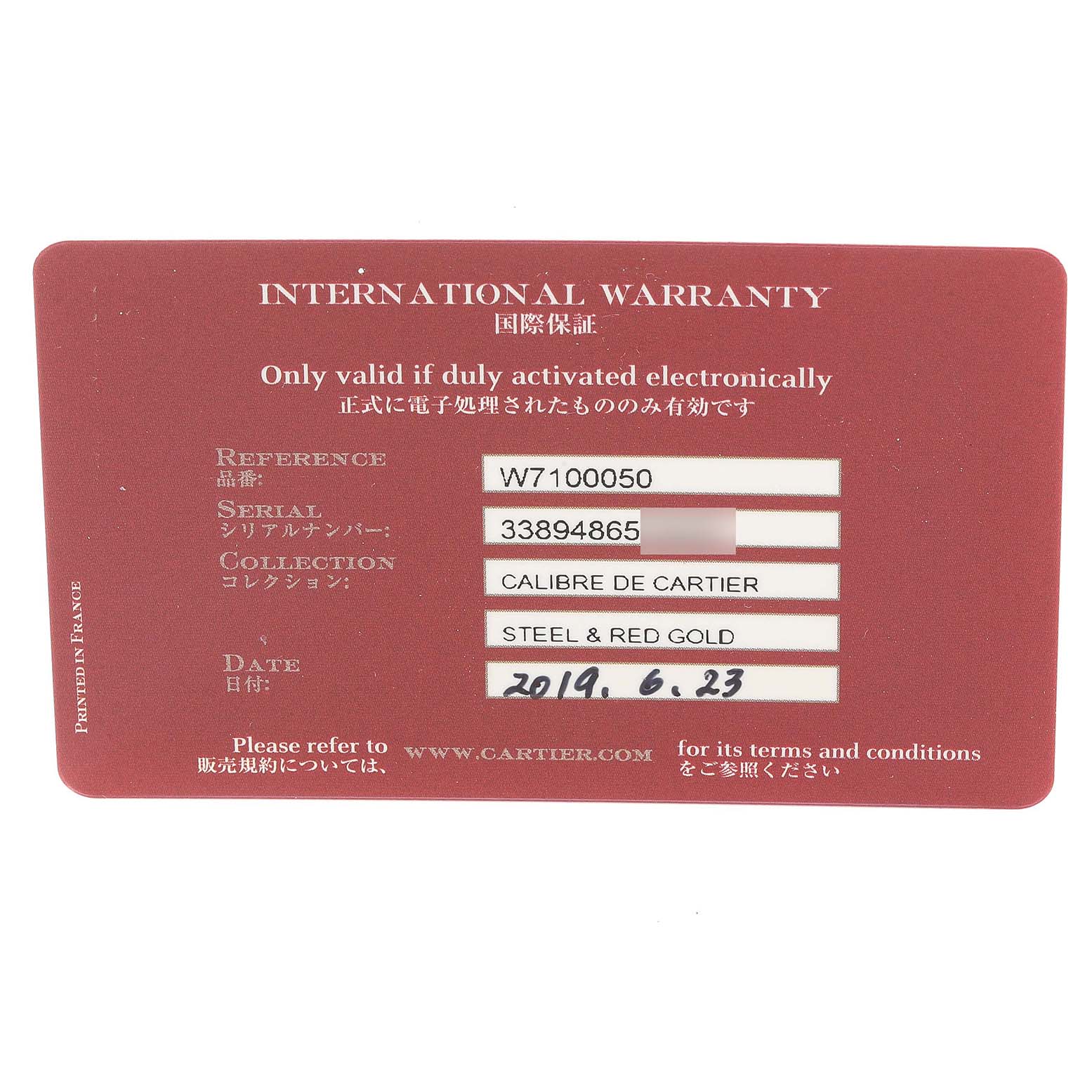 This image shows the international warranty card for the Calibre de Cartier model by Cartier, featuring reference, serial, and collection details.