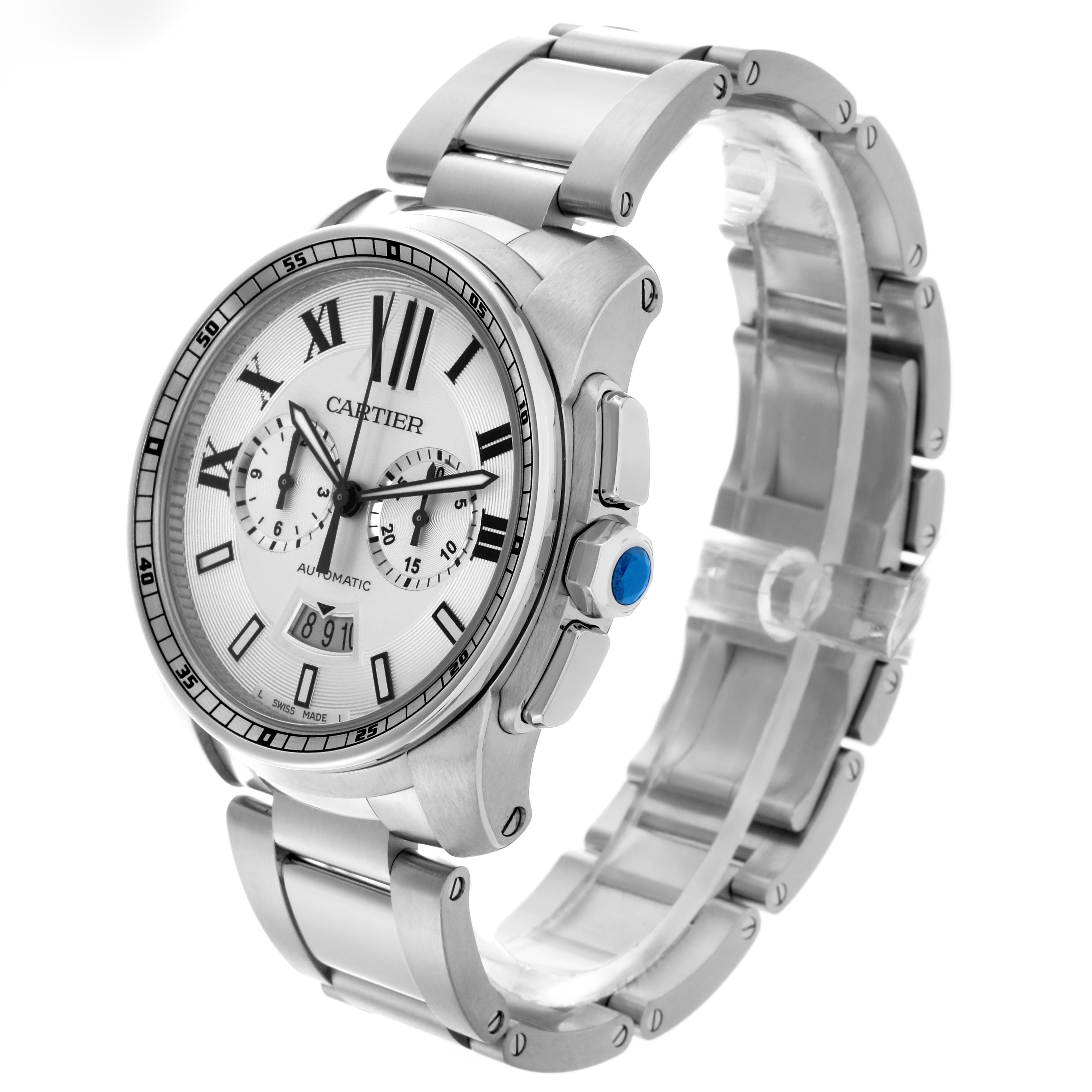 The Calibre de Cartier watch is shown at a three-quarter angle, highlighting its face, bezel, crown, and metallic bracelet.